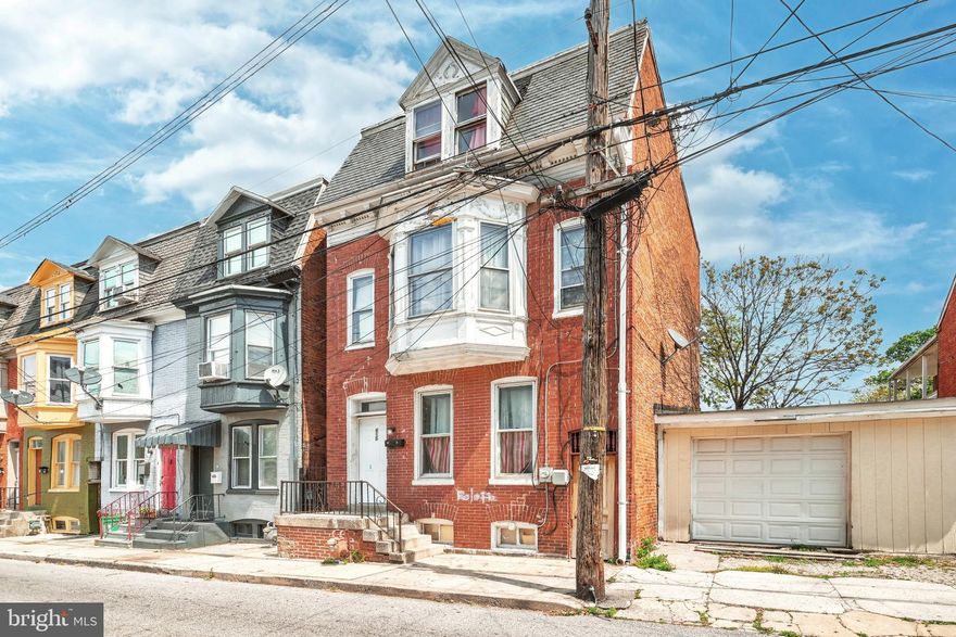 Check out this HUGE fully rented home in York City. It is currently rented to 777/m and 27/m is for sewer/trash. The lease is currently month to month! Tons of room for more rental income in this property!