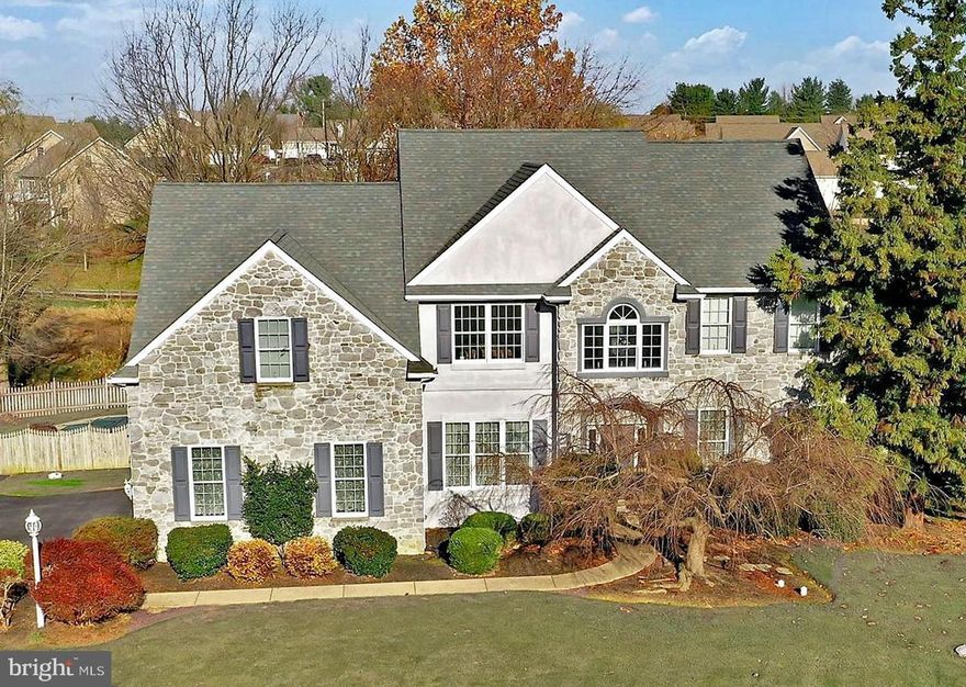 Fantastic Wetherburn location! Over an acre lot in Manheim Township and everything inside you would expect with a home like this! Bright, soaring two story foyer welcomes you as you enter and the quality touches of this home quickly become obvious….from the Persian plaster, upgraded molding, French doors and other fine touches. There’s a first floor office on your left a you enter and the formal Living Room to your right. Lot’s of hardwood and tons of natural light highlight the Living Room and flows nicely into the huge Formal Dining Room with tray ceiling.  The well planned kitchen features gorgeous granite counters, breakfast bar and sitting area too. The screened in porch is off the breakfast area and overlooks the pool and a beautiful backyard setting. The huge Family Room will be a great place to gather and features cathedral ceilings open to the loft above and wonderful gas fireplace as a centerpiece! Upstairs features include huge Primary Bedroom with cathedral ceilings and bath (with jacuzzi), as well as a large walk-in closet. 3 additional bedrooms, guest bath, and loft area are just down the hallway. Additional square footage is available in the unfinished, partially daylight lower level. Three car garage to store all your toys!