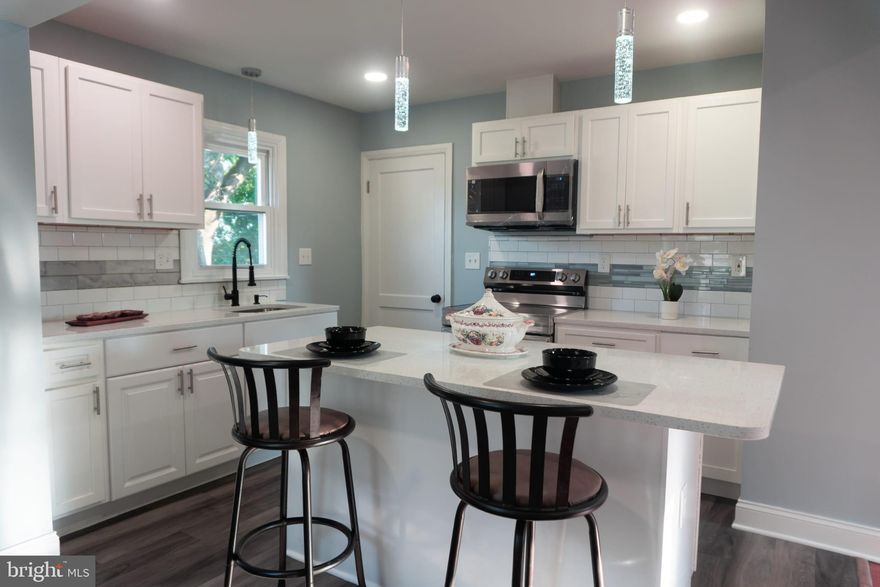 Welcome to this recently updated home at 842 Guilford Ave in Hagerstown, MD! This 3-bedroom, 3-bathroom property is ready for you to move in and make it your own. Recent updates throughout the home bring a fresh, modern touch while maintaining its classic charm.

The home features a flexible layout with a bonus attic space—perfect for an office, playroom, or quiet retreat. The finished basement offers space for  playroom or rec room.

Key Features:

3 Bedrooms / 3 Bathrooms: Spacious, updated rooms for comfortable living.

Recently Updated: Fresh paint, new flooring, modern fixtures, and updated kitchen and bathrooms.

Finished Basement: A versatile space that can be used for  playroom or rec room.

Attic: A bonus area that can serve as an office, playroom, or additional storage.

Large Backyard: Perfect for entertaining, gardening, or relaxing.

Detached Garage: 1-car garage plus a 4-car carport for ample parking.

Interior Highlights:

Open Concept Living: Spacious living and dining areas with updated flooring and lighting.

Updated Kitchen: Sleek new countertops, modern cabinetry, and stainless steel appliances.

Master Suite: A large, updated bedroom with a private en-suite bathroom.

Additional Bedrooms: Two generously sized bedrooms, both with updated design and plenty of closet space.

Finished Basement: Includes a separate entrance, a full bathroom, and space for  playroom or rec room.

Exterior Highlights:

Expansive Backyard: A large outdoor space for entertaining, gardening, or enjoying quiet outdoor time.

Detached Garage & Carport: 1-car garage plus a 4-car carport, providing plenty of parking space and covered protection for your vehicles.

Updated Exterior: Fresh landscaping and modern curb appeal, complementing the updated interior.

Flexible Spaces: Utilize the attic as an office, playroom, or additional storage. The backyard also offers plenty of room for activities or relaxation.

This recently updated home is ready for immediate move-in and offers both comfort and versatility. Whether you're looking to host in the spacious backyard, enjoy the freshly updated interiors, or create an income stream from the finished basement, 842 Guilford Ave offers endless possibilities.