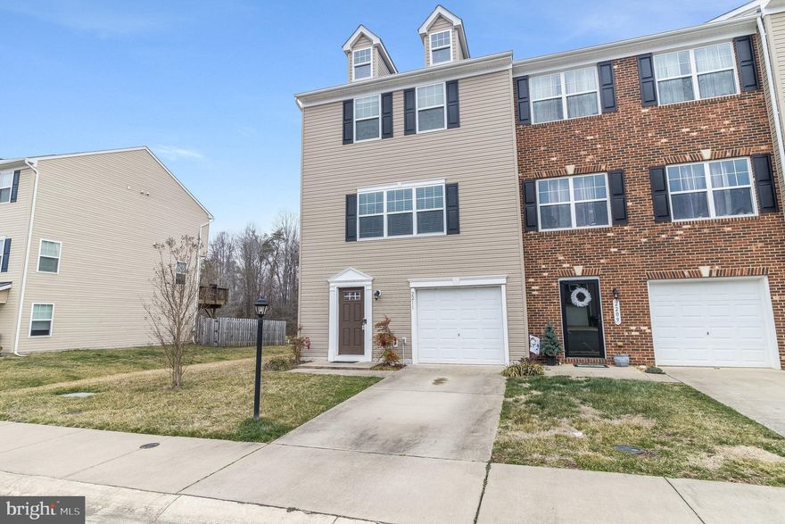 Beautiful 3 level end unit townhome with 1 car garage backs to the woods. Upgraded Kitchen with granite countertops and island and stainless appliances.  The very spacious Living Room on 2nd level with wood flooring and plenty of space to spread out. The kitchen and eat in area open up to the deck that overlooks the wooded area and fenced backyard.  This home boasts a bright and spacious living space.   A washer and Dryer on the bedroom level of the home makes laundry day less of a chore.   The main level walks out to a fenced backyard.    This downstairs rec room has a full bath and large closet, also walks out to the fence yard.   This home has been well maintained and is move in ready.  Convenient location with Spotsy VRE 7 minutes away. Downtown Fredericksburg is just a few minutes away.