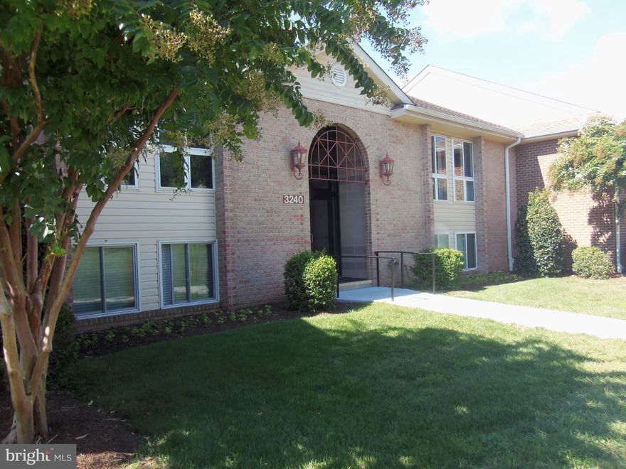 WELCOME HOME TO THIS BEAUTIFUL 2-BEDROOM/2-BATH HAMPTON DELUXE MODEL CONDO*ENCLOSED SUNROOM WITH A CREEK PASTORAL VIEW*COME BBQ ON THE LARGE PATIO AREA OUTSIDE OF ENCLOSED SUNROOM*AUTO SUNSETTER AWNING*STAINLESS STEEL APPLIANCES*HARDWOORD FLOORING*NEWER KITCHEN CABINETRY W/PULL-OUT DRAWERS*WASHER/DRYER IN UNIT*NEWER BUILDING*ADD OUTSIDE LOCK TO SUNROOM DOOR AND ENTER THROUGH REAR OF UNIT*LOW CONDO FEE COVERS ALL UTILITIES PLUS CABLE AND HIGH SPEED INTERNET SOON!   COME COMMUNE WITH NATURE AND ENJOY RETIREMENT LIVING AT ITS FINEST*A TRUE MUST SEE!!!!  PARK IN VISITOR'S OR SPACE #8