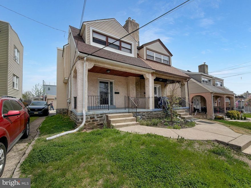 Charming and well-maintained 3-bedroom, 1.5-bath twin with beautiful wood flooring, inviting open front porch, fenced yard, and one-car garage. Spacious living room features recessed lighting and a cozy gas fireplace, while the formal dining room flows into an updated kitchen with newer stainless steel appliances, breakfast bar, and access to a large rear deck with privacy fence — perfect for entertaining, grilling, or outdoor dining. Walk-out basement offers additional living space, laundry area, updated half bath, and ample storage. Second floor includes three generously sized bedrooms, full hall bath and attic access A move-in ready home with comfort, character, and great everyday living space.