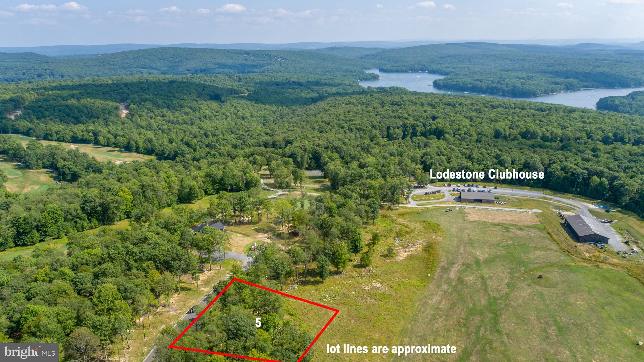 Beautiful level building lot in a serene, private golf community! Adjoining the Lodestone Golf facility, this property offers the perfect setting for your four-season getaway or primary residence. Just minutes from local dining, state parks, Wisp Resort, Deep Creek Lake and all that Garrett county has to offer. Vacation rental homes are permitted in this subdivision. All public utilities are in place, with water and sewer taps already paid for. Ready for your dream home? Call today for more details!