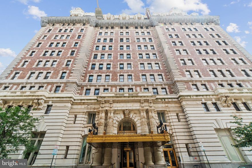 EXCEPTIONAL OPPORTUNITY in The BELVEDERE! Elegant luxury living in this extraordinary historic building built in 1903.  Once known as The Crown Jewel of Baltimore, Captivating charm surrounds you as you enter the revolving front door entry with Marble accented floors, Gilded Beaux Arts ceiling designs and more than a century of history! This one bedroom suite offers spacious rooms with fresh paint thru-out, high ceilings, new carpet, and walk in primary bedroom closet! Large windows with view of church steeple. Ready for your personal design touches. Price reflects needed kitchen and bath updates. As-is appliances. 4th floor laundry offers w/d and utility sink. On-site bar/restaurant, private party and meeting rooms. Pet friendly building! Attrached garage with inside access - additional monthly fees apply. Lots of public garage and street parking spaces closeby. The historic Mt. Vernon community offers an excellent location, parks, shopping, theatre, symphony, an array of cultural activities, gourmet and easy dining choices as well as exciting nighlife with easy access to public transportation! Penn Train Station less than 1 mi, BWI 13 miles, bus and  metro less than 1 mi, and minutes to Harbor East and the Inner Harbor stadiums! Possible seller financing to qualified buyer. A MUST SEE!!