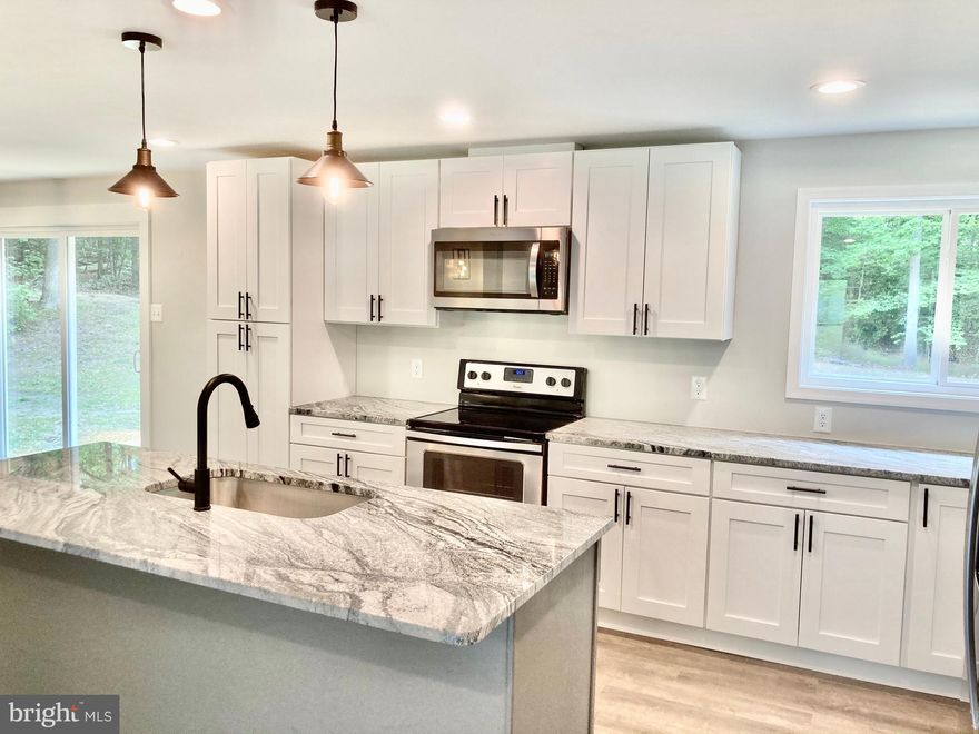 3 acre home on a private road, no HOA, backing to 154 acres of untouched property. 3000 sqft 5 beds 3 baths fully renovated home, new roof, new septic. Fully finished basement. Only 3 houses on the private street, this being the last house. Perfect place to stretch out and have some land in Lusby away from it all but still close to the grocery store. Only 5 minutes from Giant in Lusby and 12 minutes to Target.  21 minutes to Naval Air Station Patuxent River.