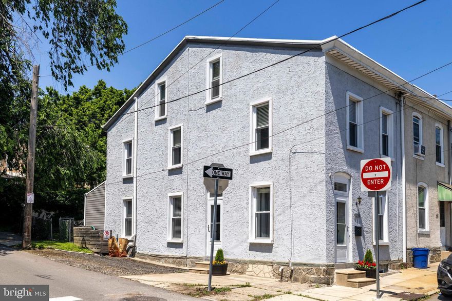 Renovated 3 story corner home with 2 PARKING SPOTS right in front of the house in the highly desirable Germany Hill section of Roxborough. Renovations include a brand new kitchen and a  blend of original finishes like brick walls, hardwood floors and claw foot tub along with modern updates throughout. 
Pull into one of the two parking spots and enter through your garden into the mudroom. You will notice the refinished red pine floors and 1st full bathroom conveniently located on the 1st floor (think pooch or kids hosing down!). You will then be in the the fully renovated kitchen with new stainless steel appliances, stunning countertops and custom floating shelves. The main level boasts high 9 foot ceilings, recessed lighting and hardwood floors. On the 2nd floor you will find 3 large bedrooms, all with hardwood floors, modern ceiling fans and large closets. The 2nd full bathroom has double vanities, modern plank tile flooring and large stand-up shower with white subway tile throughout. The 3rd floor has the 4th bedroom on one side and a den with storage on the other side. Both rooms also have refinished red pine floors. Newer HVAC system with central air, and updated electric and plumbing throughout. The exterior of this house has recently been repainted with high quality waterproofing outdoor paint along with all new siding and insulation in the back. Full enormous basement includes washer/dryer combo a workbench and storage galore. Newer upgrades include the main roof that is 4 years old and there is a 3 year old washer. The Germany Hill trails are two blocks away and so is  the highly desirable Wissahickon Valley Park Trail. This house is surrounded with  farmers markets, Gorgas Park, shopping, bars, cafes, breweries, restaurants, and is 1 mile from Main Street Manayunk.