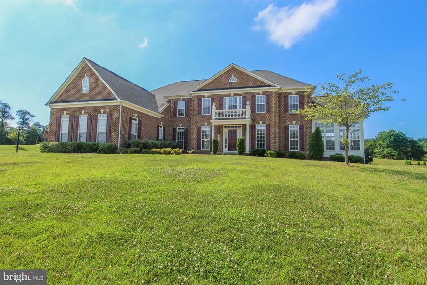 WOW!! NEW Carpet & paint!! 4 acres+ in beautiful Hamilton! AMAZING NEW PRICE! Each bedroom has its own bath, providing 4 private suites! Owner's retreat features sitting room & luxury BA. 2story fam rm w/FP. Gourmet Kit w/Granite, upgrade cabinets, SS appl, huge island! Conservatory, formal LR, DR & library! Front & back staircases! 3car side-load garage, full bsmnt to design your own flex space!