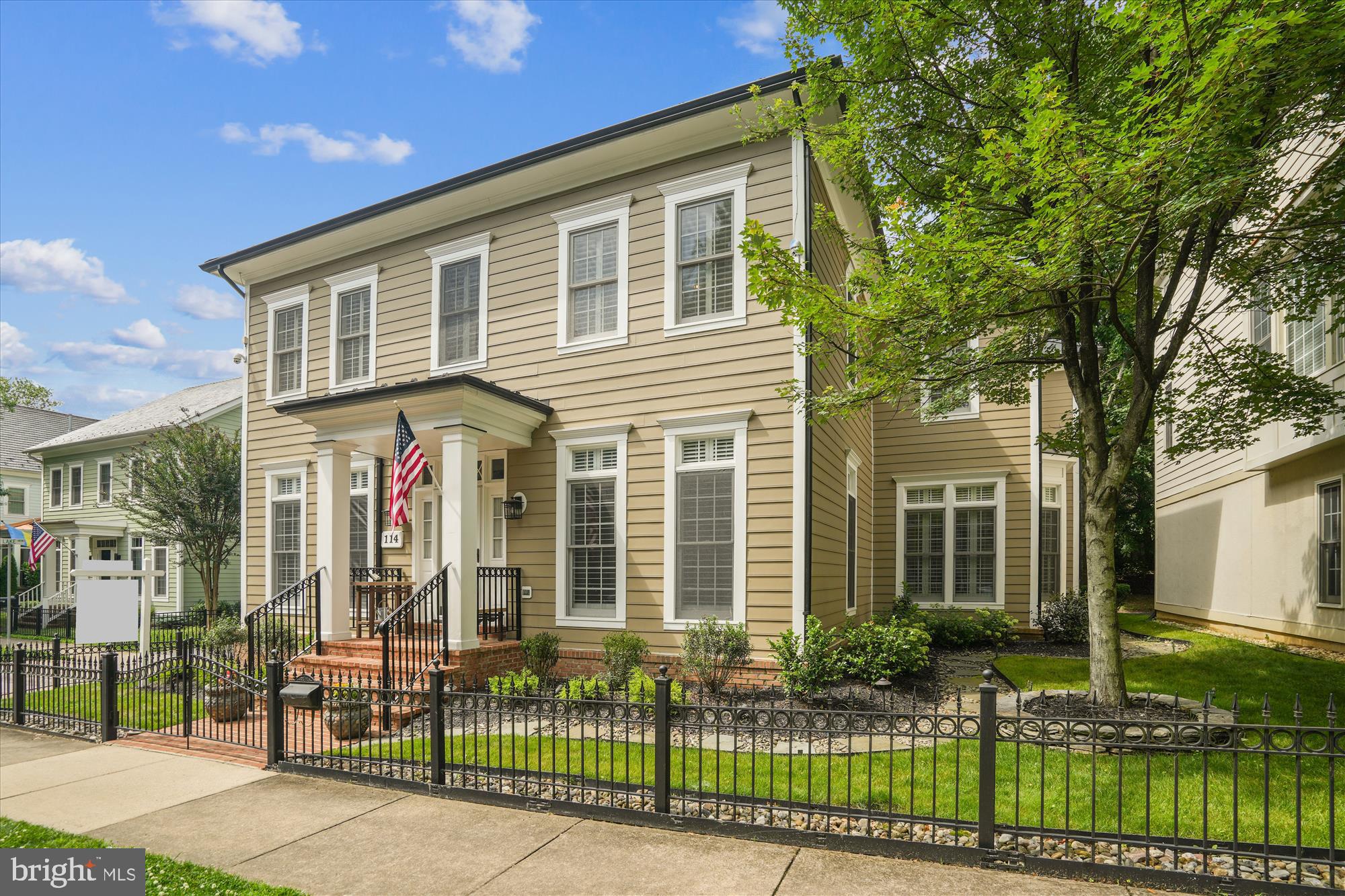 2.87% assumable rate on mortgage balance! Rarely available and absolutely gorgeous! Ideally located on coveted Lake Street, this home has been meticulously renovated from top to bottom. Hardwood floors flow from the entry foyer into the spacious living room and into the generous dining room, both featuring elegant moldings. The beautifully updated kitchen is a showstopper with granite countertops and top-of-the-line appliances, and opens onto a sunny breakfast area with a bay window. The large family room adjoins the kitchen and showcases a stacked stone gas-burning fireplace with a stone mantel and hearth, flanked by a wall of windows. An updated powder room along with a conveniently located laundry/mudroom with access to the attached garage complete the main level. Upstairs, the expansive primary suite is filled with natural light and offers a versatile sitting area, tray ceilings, and a spa-like primary bath with a custom tile soaking tub, custom vanities, and a glass-enclosed shower with dual shower heads, a pebble stone floor, and custom tilework. The second and third bedrooms are generously sized and include closet organizers. The large fourth bedroom offers hardwood flooring and a walk-in closet. The second full bath includes decorator tile, a granite vanity, and custom cabinetry, while the third full bath features granite countertops and a custom tiled shower. The finished lower level offers a large recreation room with hardwood floors and two bonus rooms—one with a kitchenette/bar area and the other with a large walk-in closet. A renovated fourth full bath completes this level. Outside, the flagstone patio is surrounded by beautifully landscaped gardens, and the fire pit creates a perfect setting for outdoor entertaining. Thoughtful upgrades include window shutters, an exterior security camera system, two updated air conditioning units, a new roof and gutter system (4 years old), a replaced lower zone furnace, a new fence and gate, and the addition of a flagstone walkway to the yard. Located on one of the most desirable streets in the Kentlands, just moments from shops, restaurants, and amenities, this home is truly exceptional.