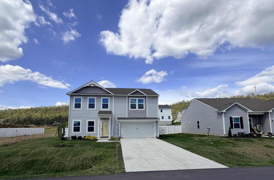 Better than new and move in ready in Dillon Farm. Recently repositioned to $399,999, this 5 bedroom, 3 full bath Water Lily model built in 2023 offers approximately 2,480 square feet of thoughtfully designed living space on a premium 0.19 acre homesite with no neighboring home to one side for added privacy.

The open main level features high ceilings, abundant natural light, and a spacious layout that connects the living, dining, and kitchen areas. The well appointed kitchen includes a large island, stainless steel appliances, black fixtures, ample cabinetry, and a large pantry.

A main level bedroom and full bath provide flexibility for guests, a home office, or multigenerational living.

Upstairs you will find a versatile loft, a full size laundry room, and a generously sized primary suite with a walk through bath, separate water closet, and oversized walk in closet. Secondary bedrooms offer comfortable space and storage.

The fully fenced backyard includes a vinyl privacy fence and a newly added concrete patio, creating an outdoor living space that many newer homes in the community do not yet offer.

Energy efficient systems include community propane forced air heat, propane gas water heater, whole house humidifier, and fresh air ventilation system. The home is also fully wired with ethernet and coax for modern connectivity.

Two car garage, extended driveway, and generous storage throughout.

Conveniently located just minutes from Interstate 81, shopping, dining, and schools. A great opportunity at the new price point with immediate availability.