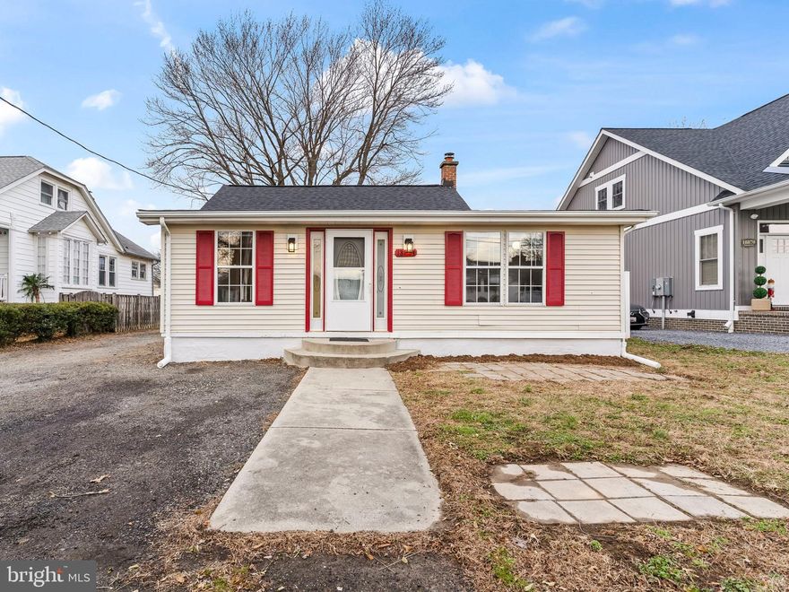 Enjoy peaceful riverside living in this charming rambler offering beautiful water views of the Patuxent River plus community pier access. The home features a maintenance-free exterior with a roof and vinyl siding, set on a large, level lot with an oversized driveway and a 1.5-car detached garage—perfect for accommodating boats or multiple vehicles. A brand-new septic system adds peace of mind and long-term value. Inside, the freshly painted interior welcomes you with an inviting living room highlighted by hardwood-style flooring and a ceiling fan, along with a bright ceramic-tiled foyer. Two comfortable bedrooms include LVP flooring in one and a spacious walk-in closet in the other. The well-appointed galley kitchen boasts generous cabinetry, recessed lighting, stainless steel appliances, and a convenient desk counter ideal for meal planning or work space. A versatile third room with vaulted ceilings and updated lighting provides an excellent option for a home office, guest room, or additional bedroom. The rear addition offers a warm dining or family room overlooking the level backyard, complete with a large concrete patio and a beautiful historic shade tree—an ideal setting for outdoor relaxing or entertaining. Additional highlights include a full bath with designer tile and a utility room with washer/dryer hookups. The perfect home for first-time buyers or those looking to downsize. Definitely worth seeing.