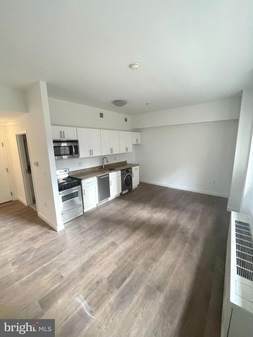 Sun-soaked studio apartment in the highly coveted Parc Rittenhouse on Rittenhouse Square. Enter the home to find an open kitchen with granite countertops, modern cabinetry, stainless steel appliances, and a washer/dryer. The sun-lit living area features great natural light from oversized windows and new grey wood-like flooring.  The recently refurbished bathroom has marble flooring and vanity countertop and a shower/tub.  Residents of Parc Rittenhouse enjoy world class amenities and services including a 24 hour doorman; an amenities suite including a state-of-the-art fitness center and resident lounge with pantry; media room; outdoor rooftop pool club with a large pool deck, full size pool, kids pool and hot tub; garage parking below the building for an additional fee (subject to availability); and two amazing restaurants on the ground floor, Stephen Starr’s Parc and Via Locusta.