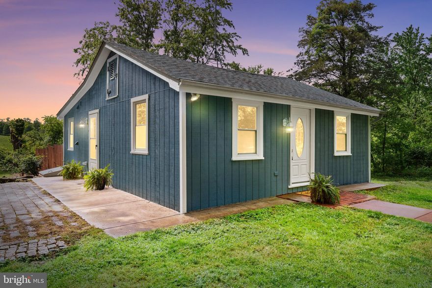 Great opportunity to purchase a serene and private property to raise chickens and grow vegetables in Hamilton, VA. Only ten minutes to Leesburg and five minutes to Purcellville, this property is the best of both worlds. The half-acre lot is surrounded by farmland, has a small creek running along one side, and offers a fenced-in area for the chickens, including a chicken coop. (Don't worry, we'll find a home for the chickens if that's not your thing!) This adorable one-level house features 2 bedrooms, 1 full bath, living and dining areas, and a kitchen off the dining area. The interior has been freshly painted and professionally cleaned for quick move-in. There is a small basement for convenient storage (access through crawl space door).  A large insulated shed with electricity has been converted to a music studio/office with French doors, windows and  (not included in square footage of main house). The exteriors of the house, studio, and shed have all been freshly painted. The house roof was replaced in 2020. Other updates include a brand-new HVAC system, well pressure tank and water filter.  Water softener, basement, exterior French drain and concrete surround were added by seller since their time of purchase.  The house is on well water but city sewer. Don't miss the opportunity to have a little slice of country solitude!