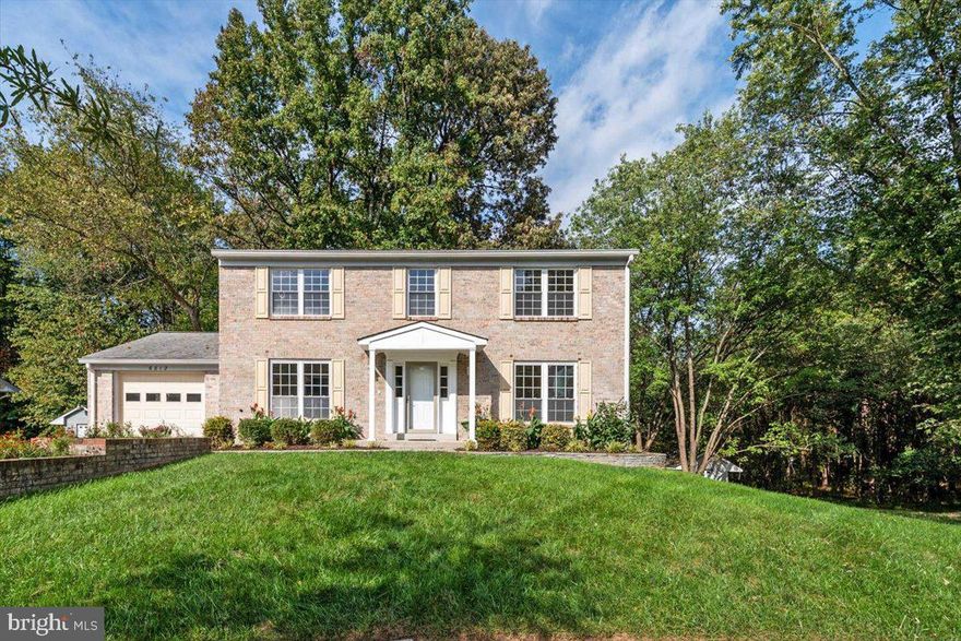 Location, location, location!  This stately colonial is arguably sited on the best lot in the community.  There's no place like home.  Located at the cul-de-sac of a quiet street, the home backs your very own nature preserve.  As you enter the home  from the covered front porch onto the hardwood foyer, which is a great feature for guests, you are welcomed by a neutral decor that flows throughout the home.  To your right is the formal living room and on your left is the formal dining room.  From the dining room you can access the kitchen, which has been totally upgraded to include cabinetry with soft-close doors and drawers, granite countertops, fixtures, flooring, and appliances.  From the kitchen, access the spacious family room where your attention might be drawn to the floor-to-ceiling, brick hearth fireplace.  Or, you might be inclined to gaze through the upgraded sliding doors that lead to the private deck overlooking a scenic view of natural beauty.  The kitchen also provides access to the garage, which includes a garage door opener.  Here you will also find a stand-up freezer that conveys with the property.  The main level also features an upgraded powder room for the convenience of you and your guests.  The carpet and pad on the upper level have been upgraded features; 4 bedrooms, all of which have upgraded lighted ceiling fans.  In the master bedroom, you'll find a private upgraded full bath and awesome walk-in closet.  The upper level also features upgraded carpet and pad, an upgraded full hall bath, and a laundry chute so your laundry magically appears near the laundry area in the lower level!  The lower level of the home is finished with a spacious family/recreation room, which includes a 2nd floor to ceiling brick hearth fireplace, a powder room, and a level walkout through an upgraded sliding door to the rear yard where you will find a shed for the storage of your mower and garden/landscape tools.  There is very little in this home that is original as the roof, hvac, windows, and many other items have been replaced.  This truly is a special home that you will want to see before it is SOLD!