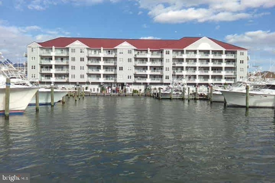 New listing in VERY SOUGHT AFTER AND RARELY AVAILABLE, White Marlin Condominium and Marina. This condominium association has just finished total exterior renovation, including replacement elevators, new doors and windows in every unit, new pool, new exterior siding, new coated walkways, new railings, and new marina decking and bulkheading at a total cost of nearly $2,000,000.00. Owner has paid special assessment in full. This 3rd floor unit has gorgeous views of the Bay, pool, marina and the most spectacular sunsets from the large waterfront balcony. It features an electric powered awning and tinted windows. A large deep water boat slip #21 conveys with this property which can be used by the new buyer if they have a boat or it can be rented for additional income. The slip can accommodate a a 50-60ft. boat. It comes with 1 assigned covered parking space. From this downtown location you can walk to restaurants and pubs, beach, boardwalk, inlet and all of the festivals. On your boat you can enter the inlet and be in the ocean in less than 5 minutes, or tie up at Assateague Island and enjoy a picnic while watching for wild ponies, sunbathing and swimming. There is no other location in Ocean City like this unique property with all of it's amenities situated at the southernmost tip of Ocean City just a few hundred yards from the inlet leading to the Atlantic Ocean. Don't miss this opportunity. Last year the condo generated in excess of $16000.00 gross rental income with the seller holding back some weeks for their personal use. The boat slip generated an additional $8500.00 rental income.