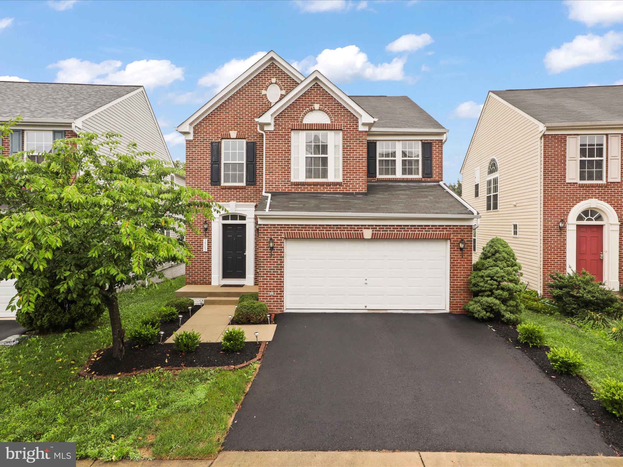 Meticulously maintained 3 level brick front colonial home offers the perfect blend of luxury, modern comfort in the highly desirable Chantilly HS district area | Inviting two story foyer greets you into the home which opens up to the elegant living room and dining room | The main level offers an open floor plan with hardwood flooring thru out the entire main floor | Upgraded window blinds on all the levels | Family room with a bump out features a gas fireplace and windows with adjacent door leading to the outdoor trex deck with stairs leading down to your low maintenance backyard | An efficient gourmet kitchen is beautifully appointed with granite countertops, custom cabinetry, kitchen island, recessed lighting and stainless steel appliances which includes gas cooktop, double wall ovens, microwave, refrigerator and a dishwasher | The garage is EV ready with an electric hookup, adding modern functionality | Upstairs, the primary suite is a luxury treat with a large bedroom, separate sitting area with windows and his and hers closet space | Master bathroom has separate tub and shower with dual vanities - upgraded shower ceramic tiles | Additional three generously sized bedrooms and a full bathroom | Upgraded carpet on the upper level | Front load Washer and Dryer are on the upper level for your added convenience | The fully finished walk up basement expands the home versality with a large finished recreation room with Berber carpet, a wet bar rough in, a full bathroom and walk up stairs to your private back yard | Close proximity of major commuter routes, Dulles Airport, Route 50, Route 28, Route 66 and unbeatable convenience of wide variety of shopping, retail stores and dining options.