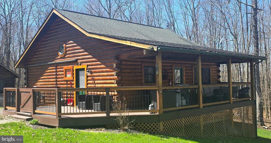 Cozy 2/3BR, 2BA log cabin with a fenced-in yard and a fabulous covered porch! Inside, features include vaulted ceilings, hardwood floors, granite counters, loaded kitchen, mini splits/AC, multiple fireplaces (gas), wet bar & rec room in lower level. The 3rd BR is on the lower level with a murphy bed and can otherwise be used as another living area. Open floor plan with impressive decor and layout. Outside, a furnished patio and hot tub invite you to unwind under mountain stars and mature trees. End your evenings gathered around the hardscaped fire pit. Outdoor shed conveys, as well. With restaurants, a market, and a movie theater just minutes away, and Deep Creek Lake State Park, Wisp Resort, Swallow Falls, and marinas within a short drive, you’re close to everything while still feeling wonderfully tucked away. Bear Paws is being offered furnished, virtually turnkey and with strong rental bookings for the rest of 2026.