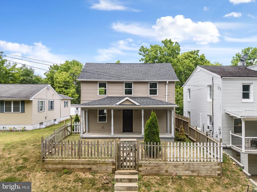 This updated 2-bedroom, 2 full bath home is ready for you to call home! It was renovated in 2019 with Pergo flooring throughout, updated stainless-steel appliances, lovely bathrooms, and a fully fenced yard. Open floor plan main level with kitchen, dining room, living room and office, a separate laundry room and a full bathroom with custom tiled walk-in shower. It also has off-street parking and backs to a treed area. Come home and watch the world go by while relaxing on the front porch or deck off the back of the house. Walk to plenty of local shopping and dining options in downtown Charles Town. Close to APUS, Hollywood Casino, downtown Charles Town farmers market, and many commuter routes. The only thing left to do is to move in!