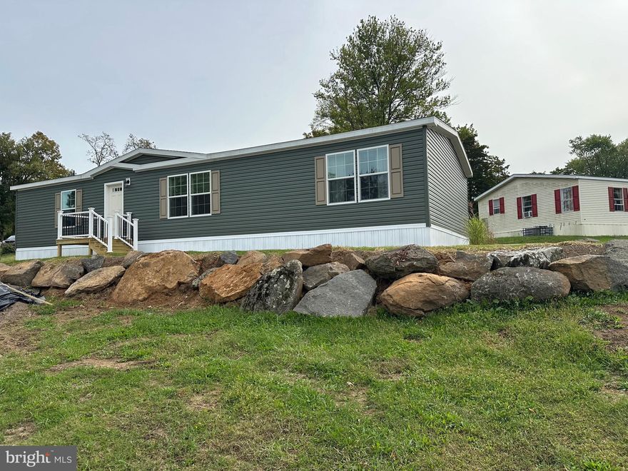 This home is one of the most popular designs of our new homes, An open concept and very spacious rooms make it ideal for entertaining . Lots of cabinets, counter space and a a hidden pantry make this kitchen a chef's delight. There is a desk area in the hallway for convenience. A generous sized laundry room completes the picture.  The $ 941 monthly lease fee includes 1500 gallons water/sewer use, pool, mini golf, chip and putt. fishing ponds and the use of the community hall for private functions. Park approval required.