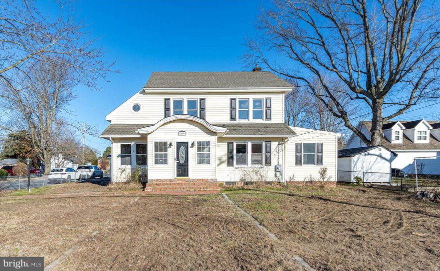 ***Home may qualify for up to $20,000 in down payment and closing cost assistance grants from Wicomico County for first time home buyers.  Based on income, property, address, and availability of funds.  Special terms apply- visit Salisbury Neighborhood Housing website for more details. 

Experience the epitome of elegance in this newly renovated 4-bedroom, 2-bath colonial residence nestled on an expansive corner lot. The exterior is a symphony of features, including a fully fenced front and rear yard, detached garage, carport, shed, and a brand-new roof.
Step into the inviting front porch, where the ambiance is enhanced by beautiful Luxury Vinyl Plank (LVP) flooring. A captivating gas fireplace takes center stage upon entering the home. Transition seamlessly into the open-concept kitchen/dining room adorned with exquisite light fixtures, stainless steel appliances, granite countertops, and new cabinetry. The convenience of a laundry room adjacent to the kitchen is complemented by a mudroom with a back door, and also providing access to the unfinished basement.
Uniquely designed, the first floor hosts a bedroom with a walk-in closet and a full bathroom featuring a stall shower. Ascend the staircase, adorned with original woodwork, to the second floor. Revel in the plush comfort of new carpeting, extending throughout. Three bedrooms await, with two boasting bonus rooms—perfect for additional closets, dressing areas, playrooms, or offices.
The remodeled bathroom on the second floor showcases a linen closet, an oversized sink, and a new tub-shower combo surrounded by all-new fixtures. Every detail has been meticulously attended to, from the new light fixtures and doorknobs to the fresh neutral paint throughout.
The property's infrastructure is equally impressive, with recent rehabilitation work on the septic tank and well, including a new distribution box and bladder tank. The newer well pump, though not part of the recent remodel, adds to the property's functionality. A comprehensive update to the home's systems includes new ductwork, an upgraded electrical panel in the basement, and updated receptacles and switches.
Benefiting from county taxes only, this home is move-in ready. Schedule your showing appointment today to witness firsthand the transformative beauty and functionality of this property.