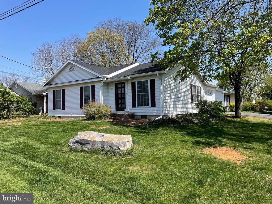 This charming Ranch-Style Home in the Heart of Martinsburg, nestled in a quiet neighborhood, 1115 New York Avenue, offers a cozy and well-maintained living space perfect for first-time homebuyers or those seeking single-level convenience. Built in 1992, this 3-bedroom, 1.5-bathroom ranch-style home boasts approximately 1,034 sq ft of comfortable living area on a 0.14-acre lot.​ 

The interior features: open concept living and dining areas with ample natural light, functional kitchen equipped with new appliances, including a dishwasher. The home has been updated with new flooring and paint, plus all the major systems are less than 10 years old: roof, A/C, and furnace.  The natural gas heating and central A/C allow for year-round comfort. The attached garage provides convenient parking and additional storage space​.  The quiet street with well-kept surroundings complements the low-maintenance exterior with a raised crawl space foundation.

This home is within close proximity to local schools, shopping centers, dining options, and interstate 81. The area is known for its friendly atmosphere and local community events, making it an excellent choice for families and individuals alike.