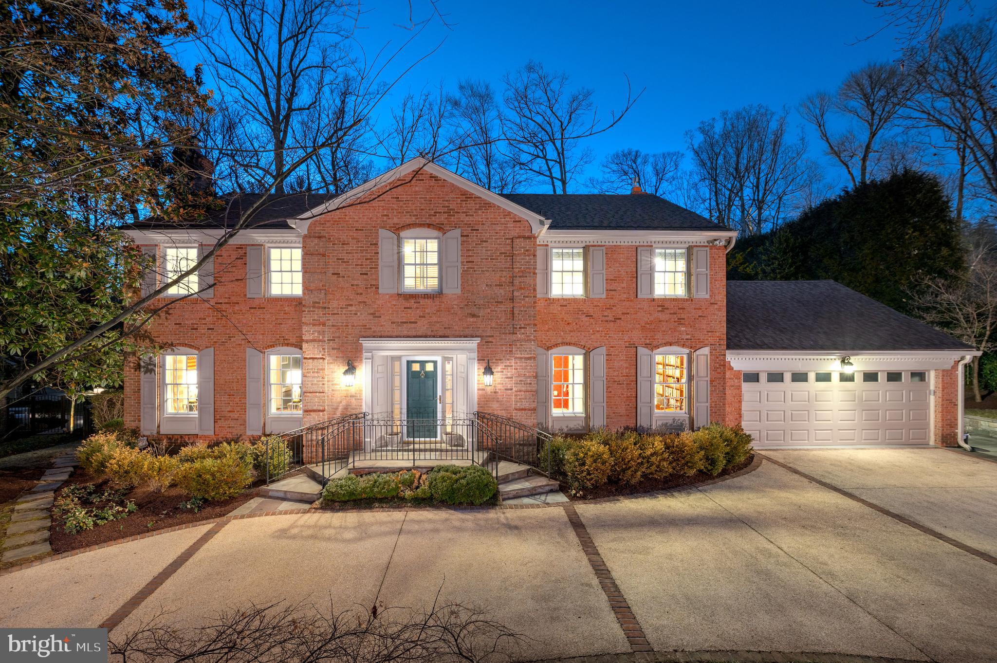 This graciously expanded and meticulously updated colonial home is the epitome of refined living, where timeless elegance meets modern functionality. From its well-manicured exterior to the sun-drenched interior, every detail has been carefully considered. Gorgeous hardwood floors extend throughout, paired with custom built-ins that add a sophisticated touch at every turn. The heart of this home is undoubtedly the gourmet eat-in kitchen highlighting custom cabinetry, granite countertops and high-end stainless steel appliances. A walk-in pantry, a center island with seating and a cozy gas fireplace with custom built-ins further enhance the space, making it as inviting as it is functional.
The kitchen flows effortlessly into the expansive family room, where soaring cathedral ceilings and French doors open to a screened-in porch, offering the ideal space for both relaxation and entertaining. The screened porch features a cathedral ceiling, built in banquette seating and slate floors, along with a solid brick foundation matching the exterior of the home. For more formal gatherings, the elegant butler’s pantry leads to the beautifully appointed dining room, complete with crown moldings and wallpaper. The formal living room is equally as charming, featuring a wood-burning fireplace and bespoke built-in bookshelves. Rounding out the main level are thoughtful spaces including a welcoming foyer, a private home office, a powder room and a well-appointed laundry/mudroom with additional built-ins and a convenient sink.
Upstairs offers four generously sized bedrooms and three full bathrooms, including the primary suite. The expanded primary suite was completely redone in 2018 by GTM architects. It features a built king bed surrounded by custom bookcases and a serene reading nook. Adjacent to the bedroom is a bespoke cherry dressing room and with ample closets, built in drawers and shoe storage shelving. The luxurious, spa-like en suite bathroom features a walk-in shower, a freestanding soaking tub, dual vanities with ample storage and linen cabinetry that exemplifies both beauty and practicality.
The lower level offers a spacious recreation room with a dedicated home gym space, along with a bonus room with ensuite bathroom—making it the perfect space to create an additional bedroom or an au paire suite . A powder room and abundant storage with easy access to the backyard completes the space. Outside, the professionally landscaped grounds are a tranquil oasis. A flat, fenced-in backyard is framed by mature trees and lush plantings, providing privacy and charm. The screened-in porch and adjacent patio create the perfect setting for al fresco dining and outdoor relaxation. The home also includes an attached two-car garage and a circular driveway, providing ample parking for guests.
Located in the coveted Burning Tree neighborhood, this stunning residence is just minutes from downtown Bethesda, with convenient access to Washington, D.C., and an easy commute to Northern Virginia. An unparalleled blend of sophistication, comfort, and location—this home offers a truly exceptional living experience.