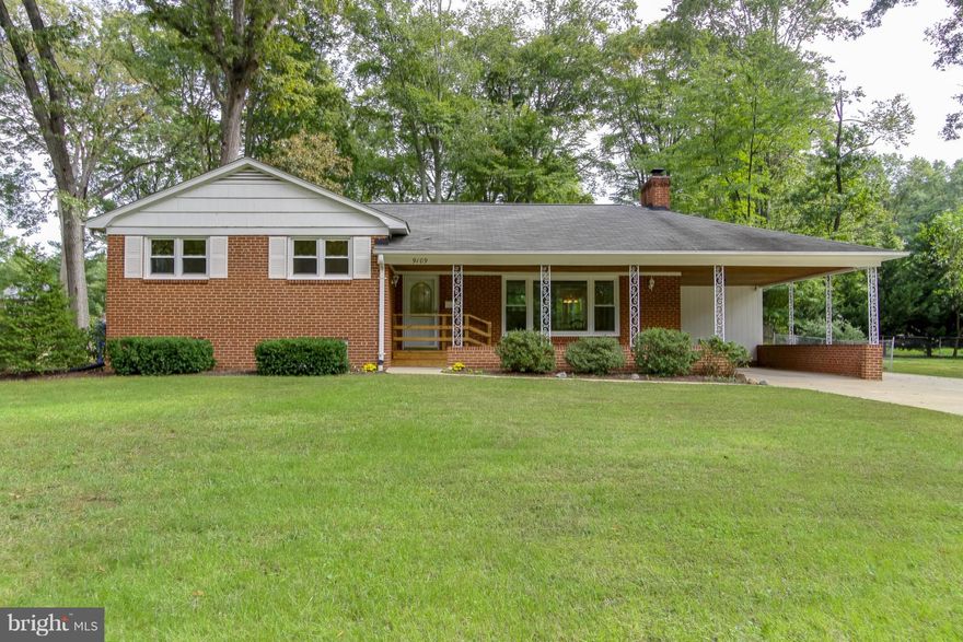 Welcome Home! Well Maintained SF Home on Large level lot w/ Oversized carport! Spacious ML w/ Formal LR w/FP, Sep DR,& Large Eat in Updated Kitchen w/ door to Patio overlooking large flat rear yard!  UL has MBR w/ MBA, & 2 other spacious BDRMS & additional full BA!  LL has RR & Additional Br/Office with 1/2 BA.  HDWDs under carpet on ML & UL's! New Windows! Close to Ft Belvoir, MT Vernon, GW PKWY!