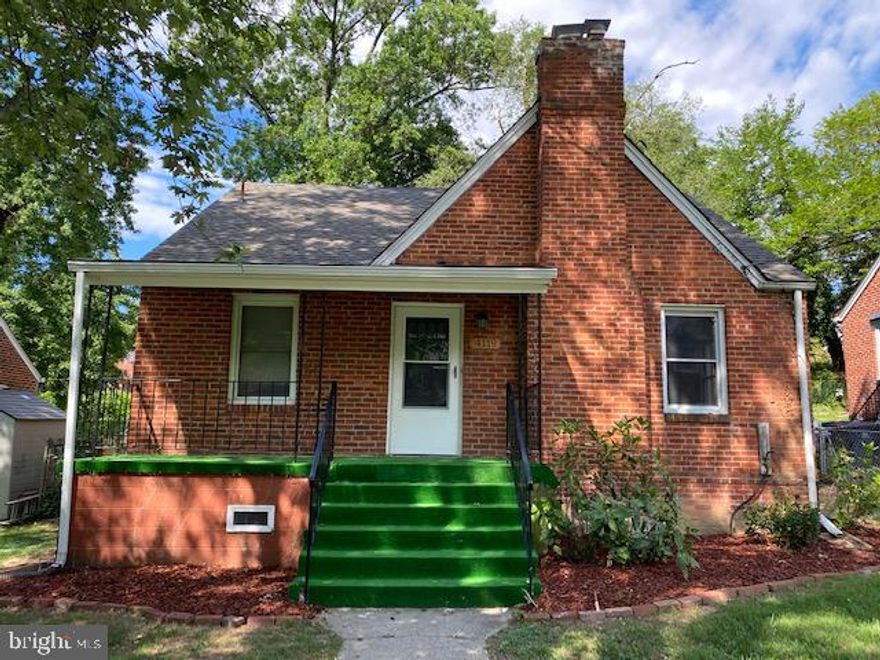 Price adjustments! Beautifully renovated 3 level all brick single family with 4BRs, 2 full & 1 half baths finished basement & good lot size.  New gourmet kitchen cabinets w/ backsplash, granite countertop, & stainless steel appliances.  New roof & gutters. New HVAC (condenser, coil & furnace). Nicely updated all bathrooms. All new windows (basement).  Other new features included carpets on upper floor & basement, hardwood floor in the main level. Washer/Dryer,  freshly painted, new fixtures & much more.  Upgraded main circuit panel & water heater. Enjoy your front porch and two fireplaces.  No HOA Fees. Minutes to DC, 495 & Pennsylvania Ave.  One of the best values 4 bedroom  single family in the area. A  Must tSee!