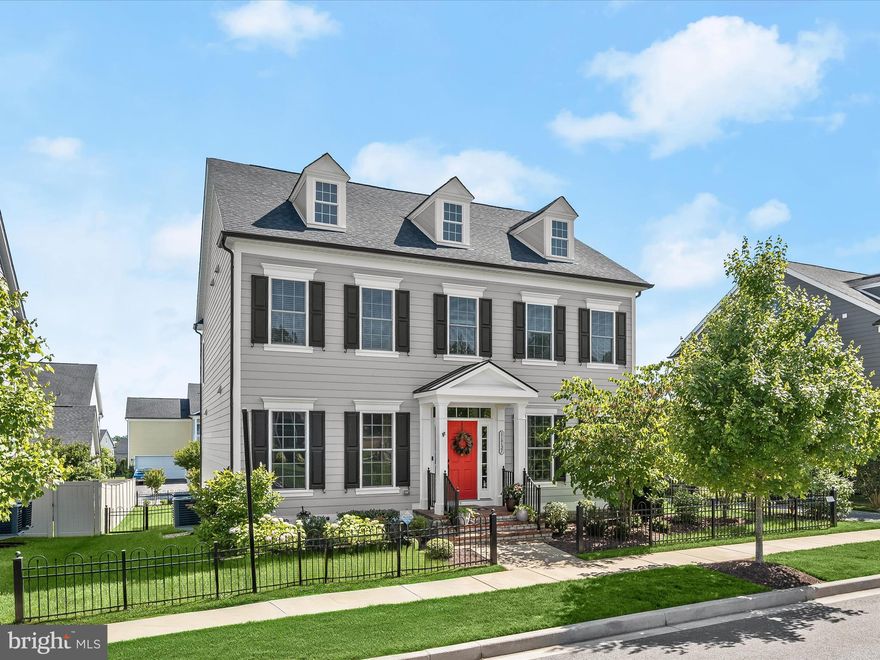 Welcome home to 11737 Federal Street in Maple Lawn’s highly sought after Garden District. Located on one of Maple Lawn’s most coveted streets and privately tucked away in the rear of the community, this Beaconsfield floorpan built by NV Homes has it ALL. Boasting 5 bedrooms, 4.5 bathrooms, 4,704 total square feet and a detached 2-car garage, this incredible luxury property is about as turnkey as it gets. Your outdoor oasis is completely finished and ready for your enjoyment; a magazine-worthy deck and patio complete with gas powered fire pit and lawn irrigation system already in place in the sizable yard. 

The main level features an expertly designed chef’s kitchen with white shaker-style cabinetry and white quartz countertops which contrast stylishly with the grey island. You’ll find high-end details and finishes throughout like the coffered ceiling in the living room and the tray ceiling in the dining room. And the family welcome center off of the sunroom will keep everyone organized. 

Upstairs, a lavish primary suite awaits complete with another tray ceiling and two spacious walk-in closets featuring professional organizing systems. The guest room boasts its own en suite bathroom. And the 3rd and 4th bedrooms share a buddy bath. The laundry area is conveniently located on the upper level as well. The lower level features a large open recreation room and a second office with French doors that could also be enjoyed as a media room. There’s also a 5th bedroom with full bathroom located downstairs. 

Zoned for highly rated Howard County Schools, conveniently located close to all major Baltimore/DC commuter routes, and with enviable amenities including a resort-style community pool, tennis courts, pickleball courts, basketball courts, state-of-the-art gym and more, you’ll quickly see why Maple Lawn is one of the most sought-after communities in the region.