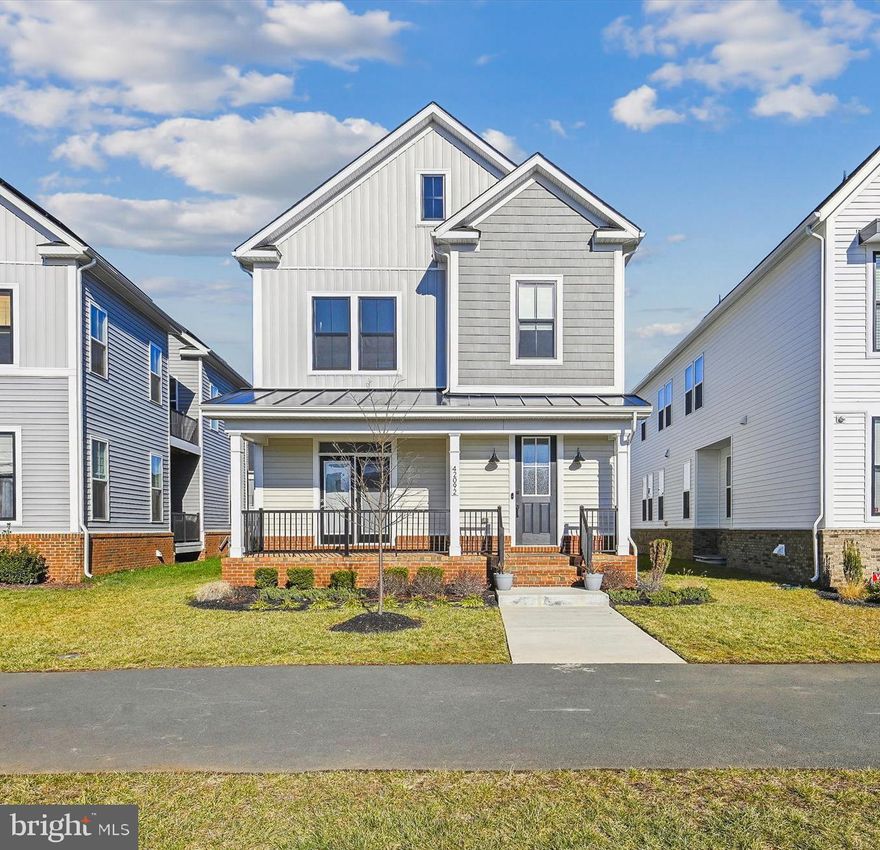 This Brambleton beauty is better than new and available for immediate move-in!  You will be delighted with this impeccably maintained and well priced Van Metre Porter model with all the extra options - main level bedroom/den, inviting deck with custom awning, upper level deck off the luxurious primary suite, finished walk up lower level with rec room, 6th bedroom and full bath.   Additional upgrades include luxury vinyl plank floors (LVP) on all 3 levels, designer paint and wall treatments, upgraded kitchen with "smart" refrigerator, GE Monogram gas cooktop and stainless hood an extended quartz island with ample seating for 6, plus designer light fixtures!  Added bonuses - huge upper level laundry, Elfa closet systems in all bedrooms and a finished garage with epoxy floor!   This home has all the bells and whistles, it will not disappoint!  Ideal location - walk to the award winning elementary, middle and high schools, minutes to the shops, restaurants and movie theatre at Brambleton Town Center.  Live the Brambleton lifestyle - clubhouses, pools, sport courts, playgrounds and miles of hiking and biking trails.  Excellent commuter location is minutes from the Silver Line, Dulles airport, and major commuter routes.  Don't wait for new, take advantage of this fantastic opportunity to own an impeccable, upgraded home in a prime location and start enjoying your new home now!  For open house, park on Glenwood Heights Circle and walk to front of home.