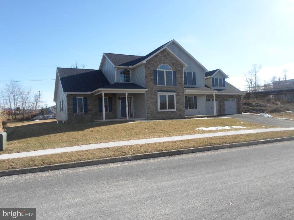 New construction ready for occupancy in Hollar Heights. Over 3000 square feet of finished living space. Oak kitchen with granite counter tops and center island is open to dining room. Two sided gas fireplace in living / dining rooms. Living room with two story ceiling. Staircase open to second level. Den and laundry room. Master suite with whirlpool tub on main level. Over sized garage.