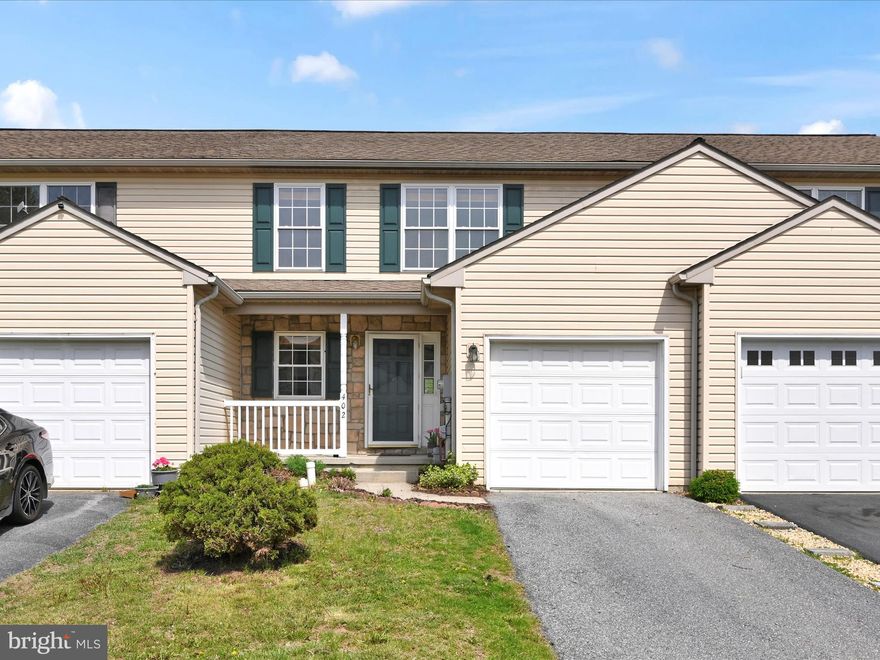 Enjoy this one time owner townhome near the back of Elmshire in a quiet area. Built in 2005 with 1368 square feet in the upper levels and another 300+ in the lower level with a finished family room that looks out back to a patio & large yard, plus a roughed in half bath with a large storage area. (17 x 12) The one car garage is handy just off the kitchen.  Enjoy the  A/C and gas furnace installed in 2018, plus a updated gas hot water heater the same year. The appliances stay, washer and dryer are in the half bath on the first floor also. A home warranty is included for the buyers at closing.  ( see with documents online) The kitchen appliances stay, stainless steel built in microwave 2 years old, newer large, stainless steel refrigerator and dishwasher and brand new gas stove just added.  The newer backsplash gives a more modern appeal.  A deck overlooking the back yard is just off the dining area. Most floors were updated with hardwoods floors. The upper level master bedroom is huge with it's private full bath for privacy and a large walk in closet( 9 x 6). 3 nice size bedrooms plus the lower level family room with recess lighting is convenient for extra living space. The back yard is open to fields behind it for lots of open space and privacy.  In the spring you'll enjoy all the flowering trees in the yards.  HAO rules are uploaded online.