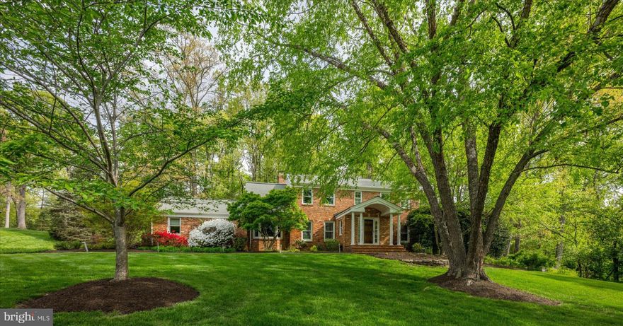 Handsomely sited on almost one acre, 7908 Foxhound Road has been thoughtfully expanded and updated to include great views of the huge treed backyard.  Exceptional in both scale and layout, this beautifully designed residence offers over 5,000 square feet of well-appointed living space across three finished levels, blending spaciousness, functionality, and timeless appeal. The main level was designed for everyday living and entertaining, featuring expansive formal and casual spaces. A generous living room and formal dining room provide classic gathering areas, while the oversized family room—measuring over 23 feet in length—serves as the heart of the home with seamless access to the outdoor terrace. The adjacent breakfast area and large kitchen create an inviting hub, complemented by a walk-in pantry, dedicated desk area, and direct access to a mudroom/laundry space. A private study and additional den offer ideal flexibility for work-from-home or quiet retreats. The main level is further enhanced by a two-car garage and a separate substantial workshop, a rare and highly desirable feature. Upstairs, the home features four spacious bedrooms, including a generously sized primary suite with a walk-in closet and private bath. The additional bedrooms are well-proportioned and share access to a full bath, while an attic space provides extra storage or future expansion potential. The fully finished lower level adds valuable living space with a large recreation room, a separate rec area, wet bar, full bath, and utility/storage rooms—perfect for entertaining, hobbies, or extended living arrangements. Outdoor living is equally impressive, highlighted by an expansive terrace that extends the living space and offers a beautiful setting for gatherings or relaxation. With its versatile layout, abundant square footage, and thoughtful design elements throughout, this home presents a rare opportunity to enjoy space, comfort, and functionality in a highly desirable setting.  McLean Hunt is highly sought after for its access to Tysons and Dulles Tech Corridor and it is just minutes to some of the most beautiful parks including Scotts Run, Difficult Run and Great Falls National Park. Nearby amenities include Spring Hill Recreation with tot lot, four artificial turf fields, a baseball field and batting cage, as well as the Hamlet Swim and Tennis Club and two playgrounds at Spring Hill Elementary.