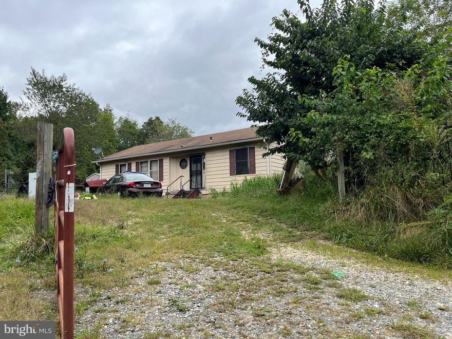 Almost 14 ACRES for the price of a house, and you can buy it with a conventional loan or a FHA 203K, the house is occupied,in living conditions. Needs to update everything but works. The value is not on the house, but in the land. Sit on this property for few years and cash out later! Or, if you are looking for one, build your private paradise updating this functional single house.
Chicken coop close to the house in good conditions comes with the animals.
Machinery, cars, boats and more comes with the property.
More pictures can be send by request.