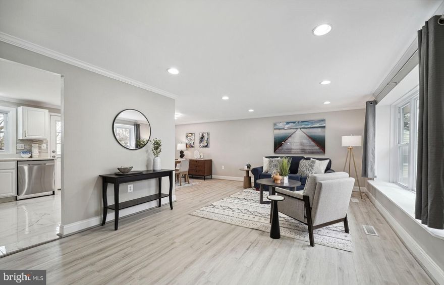 Gorgeously remodeled split level 4-bedroom 3 full bath home with 2 car garage in the lovely Pinefield neighborhood. Brand new HVAC system, windows throughout, flooring, paint, lighting, front door, and appliances! From the moment you walk through the door you will be amazed at the attention to detail. The main level boasts an open floor plan, with a living room that has a massive picture window that leads into the dining room, and then to the show stopping kitchen. The fantastic kitchen is equipped with new cabinetry, stainless steel appliances, new backsplash and quartz countertops, new marble tile flooring and convenient breakfast bar. Continue to the lower great room to relax in front of your brick fireplace/wood stove. Expansive glass doors lead you outside to your outdoor oasis, fenced for your furry friends. Additionally, there is a spacious bedroom and newly remodeled full bathroom with upgraded tile shower to complete this level. Upstairs the primary bedroom has large dual closets and newly remodeled private bathroom with enlarged tiled shower. The hall full bathroom is also newly remodeled and is quite extraordinary. Two additional spacious bedrooms complete this level. The two car garage has a newly epoxied floor. Convenient to commuter routes, shopping and restaurants. A must see!