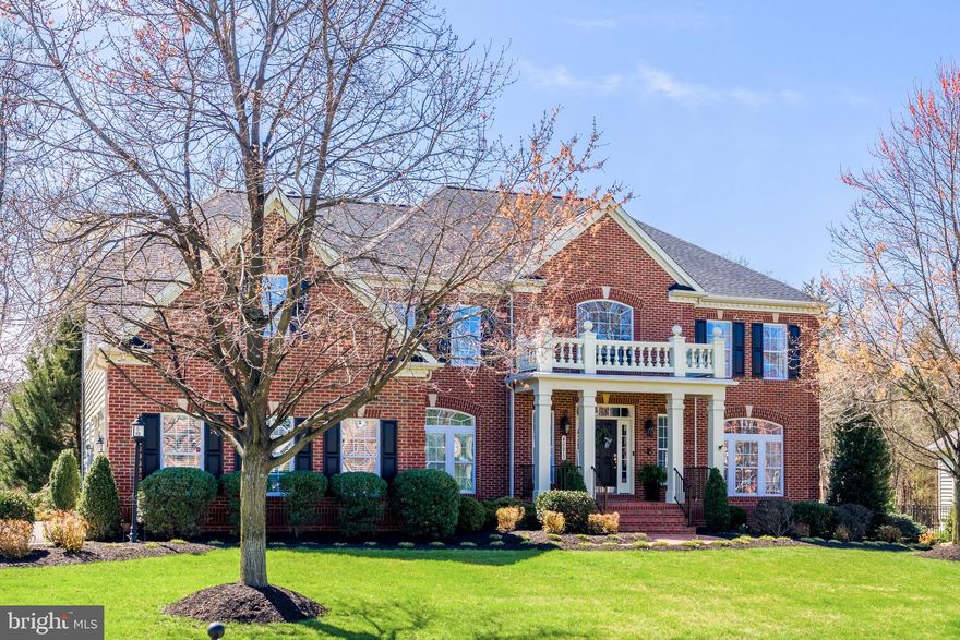 You must see this exceptional gem! Thoughtfully designed to meet every item on your wish list, this stunning residence offers 8,444 sq ft of luxurious living and has been meticulously cared for over the years. ✨Perfectly situated on a very private, serene half-acre lot, this home welcomes you with a dramatic entrance featuring a breathtaking double staircase, soaring ceilings, rich hardwood floors, and elegant crown molding throughout. The spacious floor plan includes formal living and dining rooms with refined details such as chair rail molding and expansive windows that fill the space with natural light—perfect for both everyday living and elegant entertaining. The gourmet kitchen will truly impress, showcasing upgraded cabinetry, a large center island, granite countertops, stainless steel appliances, a huge walk-in pantry, and a generous eat-in area. Just beyond, a light-filled sunroom overlooks your peaceful backyard—creating the perfect space to relax and unwind. The expansive two-story family room is a showstopper, featuring a coffered ceiling, a stunning gas fireplace with stately built-ins, and dramatic floor-to-ceiling windows that flood the home with light. The main level also offers a versatile room ideal for a home office or bedroom, with a full bathroom conveniently located next to it—perfect for guests or multi-generational living. A well-appointed laundry/mudroom adds everyday convenience. Upstairs, you’ll find four spacious bedrooms—each with its own private bathroom, offering exceptional comfort and privacy. The luxurious owner’s suite is a true retreat, featuring a sitting area, generous walk-in closets, and a spa-inspired bath with a soaking tub and an expansive walk-through shower designed for ultimate relaxation. The lower level is an entertainer’s dream, offering a wet bar, a dedicated workout space, a bedroom with full bath, and a playroom/movie room ready for unforgettable gatherings. Multiple flexible living zones and a second fireplace create warmth, comfort, and endless possibilities. Storage is unmatched with a huge walk-in pantry, nine additional closets, and a dedicated storage room, ensuring space for everything. Step outside to your own private outdoor oasis, professionally landscaped with a sprinkler system, a spacious patio, and a massive stone fire pit—perfect for entertaining or peaceful evenings under the stars. The stunning pavilion with a stone fireplace, projector screen, and built-in speakers creates an incredible outdoor living experience you can enjoy up to nine months of the year.
Ideally located just minutes from shopping, restaurants, and scenic walking trails, this home also offers close proximity to Beaverdam Reservoir, where you can enjoy boating, fishing, paddleboarding, hiking trails, and picnic areas. Commuters will appreciate being less than 2 miles from the Metro station, with easy access to major roads and a nearby international airport. With numerous upgrades throughout, exceptional care, and an unbeatable combination of luxury, space, location, and privacy—this home truly stands out. Don’t miss this rare opportunity to make it yours. 💫