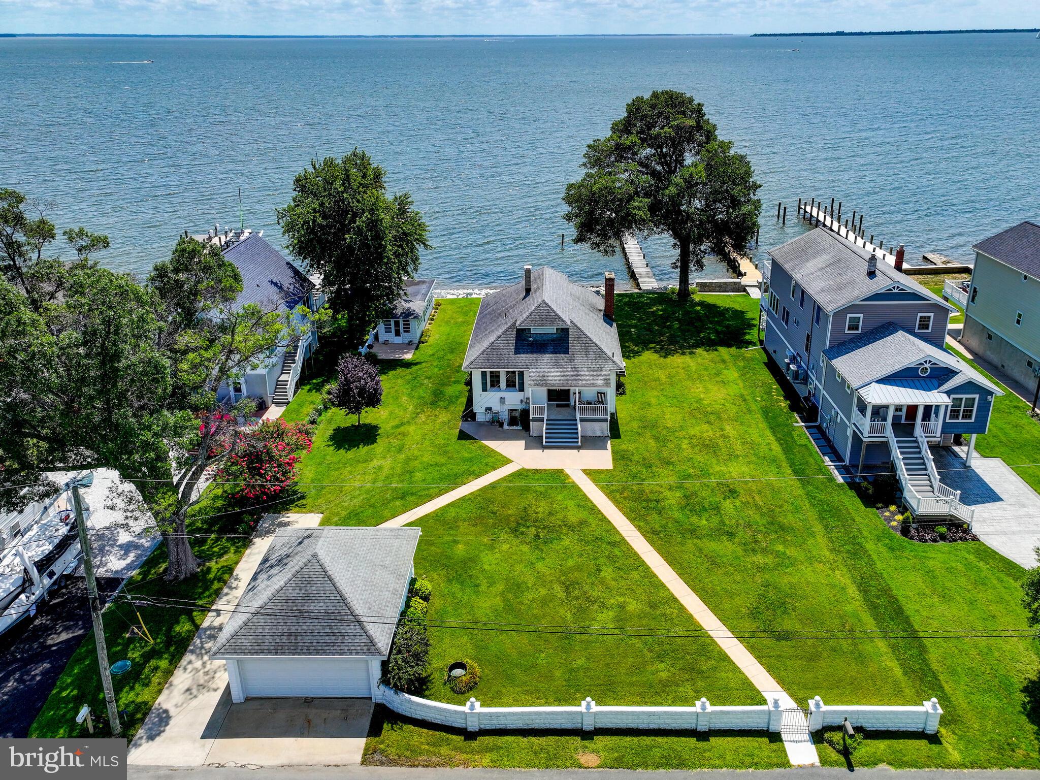 Welcome to 3831 Bay Drive - a classic waterfront home in Bowleys Quarters on a rarely available large flat double Lot boasting over a 100 ft of water frontage and picturesque million dollar panoramic views of the Chesapeake Bay - available to purchase for the 1st time in over 50 years!
This stunning 0.46 acre property features a Pier with mechanical Boat Lift, a concrete kayak or jet ski launching ramp, stone shoreline bulkhead, a detached waterfront Cabana Room, a detached 2 car Garage with automatic door, 2 concrete patios, mature landscaping and an invisible electric dog fence.
(Buyer to verify the subdivision potential of the double Lot)
The home features two covered porches that are perfect for relaxing or entertaining guests, 2 sizable Bedrooms and 1 full Bathroom with a tub shower combo, high ceilings throughout, a wood burning Brick Fireplace, hickory wood Floors in the Living Room. 2 Bay Windows with water views, a main level Laundry Room, Attic, Basement, Central A/C and forced air Heat.
This rarely available property is an absolute MUST SEE to truly appreciate the value and the potential. Make your appointment today!