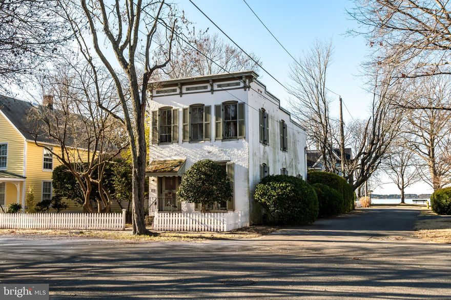 The John Moll House: This amazing Federal brick "row house" is in Oxford's Historic District. It is ready for someone who loves old homes to renovate as they would like subject to Oxford’s Historic Guidelines. The character and charm are felt in each bright room. The back of the home overlooks a lovely large fenced garden with views of the Tred Avon River. The primary bedroom can be finished on the first floor with room for a spacious bath and closet. This is truly an opportunity to finish your home with your ideas. The property is being sold "as is" with plans available to see. Several permits have already been obtained.