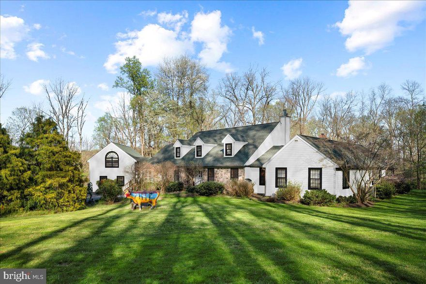 Your search for your dream home starts and ends here!!  Tucked away on 13 magnificent acres in bucolic Bucks County and just outside of historic New Hope, Pa, is this Enchanting Artist's Home..... Where Art and Life Converge.     New Hope, Pennsylvania, a town steeped in artistic enchantment, has woven its legacy into the very fabric of creativity. Since the late 19th century, a cadre of visionary artists—often referred to as the Pennsylvania Impressionists or the “New Hope School”—has graced this picturesque haven with their inspired brushstrokes and poetic visions. Luminaries such as William Langson Lathrop and Edward Willis Redfield laid the foundation of an enduring artistic tradition that still resonates through the town’s lush landscapes and historic streets.   This home, also known as Dark Forest,  just minutes outside of the beautiful river town of New Hope, is a testament to the town’s artistic spirit, celebrating life through every pixel and canvas. The owner's  influence extends beyond her captivating works; she recently made headlines for her extraordinary generosity, giving away 400 of her paintings—not for profit, but as gifts to those who truly appreciate her artistry. This act of giving not only highlights her profound connection to the community but also embodies the essence of New Hope—a place where the ordinary dissolves into a tapestry of creativity, and where artists breathe life into every brushstroke. New Hope itself is a living canvas, a sanctuary where imagination thrives, and the echoes of artistic pioneers continue to inspire and enchant.  Step across the threshold of this New Hope residence, and you’ll find yourself immersed in a world where art transcends mere aesthetics.  As you approach through the entrance, a picturesque drive leads you to this private oasis. The grandeur of the property unfolds before you, surrounded by lush greenery and mature trees.  Much like the owner's paintings, the two-story entryway frames views of the living room—a sun-drenched space w/an expansive wall of windows. Here, warmth and creativity converge.  This sprawling home epitomizes elegance and comfort, offering sophisticated one-floor living just under a mile from the charming New Hope Borough.   Natural light floods every room, enhancing the open and airy floor plan. Two “parlor” rooms offer versatile spaces, perfect for home offices or quiet retreats. The open living room features a cozy gas fireplace, creating a warm ambiance during colder months. It has also hosted memorable concerts and charity events.  Vaulted ceilings and skylights grace the enormous finished room over the three-car garage, currently set up as a home office. This space offers flexibility and convenience. The heart of the home is the primary suite wing—a true sanctuary. Enjoy evenings by the gas fireplace or unwind in the adjoining sunroom with a hot tub. The spa-like primary bathroom boasts a steam shower and a state-of-the-art Toto bidet toilet. Three sets of sliding glass doors invite you to the backyard and patios, seamlessly connecting indoor and outdoor living.  Outside, the breathtaking pool area mirrors the artist’s palette. Reclaimed flagstone patios and artistically crafted stone walls surround the pool, promising endless days of leisure and entertainment. As you lounge by the water, you’ll feel the same wonder that Mintzer infuses into her art—a sense of magic and possibility.  The meticulously landscaped grounds feature flowering trees, ensuring privacy and serenity.  Three electric awnings promise endless days of leisure and entertainment. While you revel in tranquility, the vibrant towns of New Hope and Lambertville, NJ, are just moments away. Plus, residing in the award-winning New Hope Solebury School District adds to the appeal.  This property harmoniously blends grandeur, privacy, and convenience—an ideal haven for those seeking luxury & Privacy.