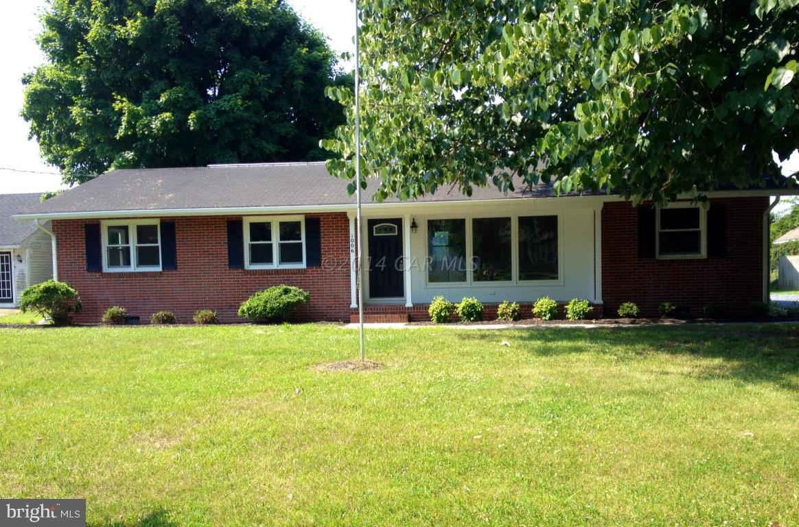 Remodeled house with new Kitchen cabinets, appliances, counter tops, hardwood floors in Living Room & Dining Room, Hallway, new heat pump, electrical wiring. Must see Garage; has Workshop.