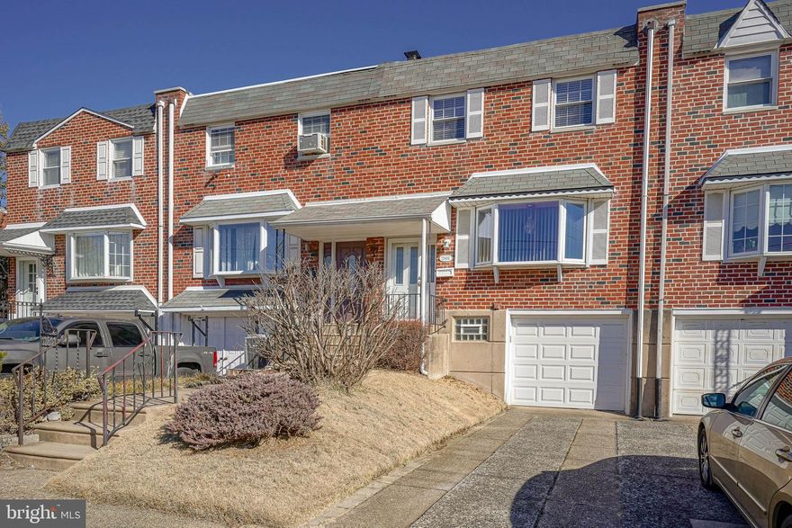 Charming & Well-Maintained
Home in Parkwood - NE Philly!
Welcome to this beautifully kept home in the desirable Parkwood section of Northeast Philadelphia!
Boasting fantastic curb appeal with a classic brick front,  a wide street rarely seen in the city, 3 generous sized bedrooms, 1 full bath with a skylight, and attached garage which fits an SUV vehicle, this home offers  convenience, comfort and plenty of space.
Step inside to an inviting living room where the beautiful bay window captures natural light.  From their, you can host your guests in the formal dining room which makes  gatherings perfect.  You'll also enjoy the immaculate eat in kitchen which flows from the dining room; making cooking and serving your guests convenient.   This  home also features original hardwood flooring in two bedrooms, a newer roof & newer  hot water tank.  Enjoy the large fenced yard, ideal for outdoor entertaining, gardening, or relaxing. The spacious, unfinished basement offers endless possibilities and includes inside access to the garage and backyard  and features a large laundry room. 
Don't miss the opportunity to make this charming and spotless home yours!  Come look then make the investment!