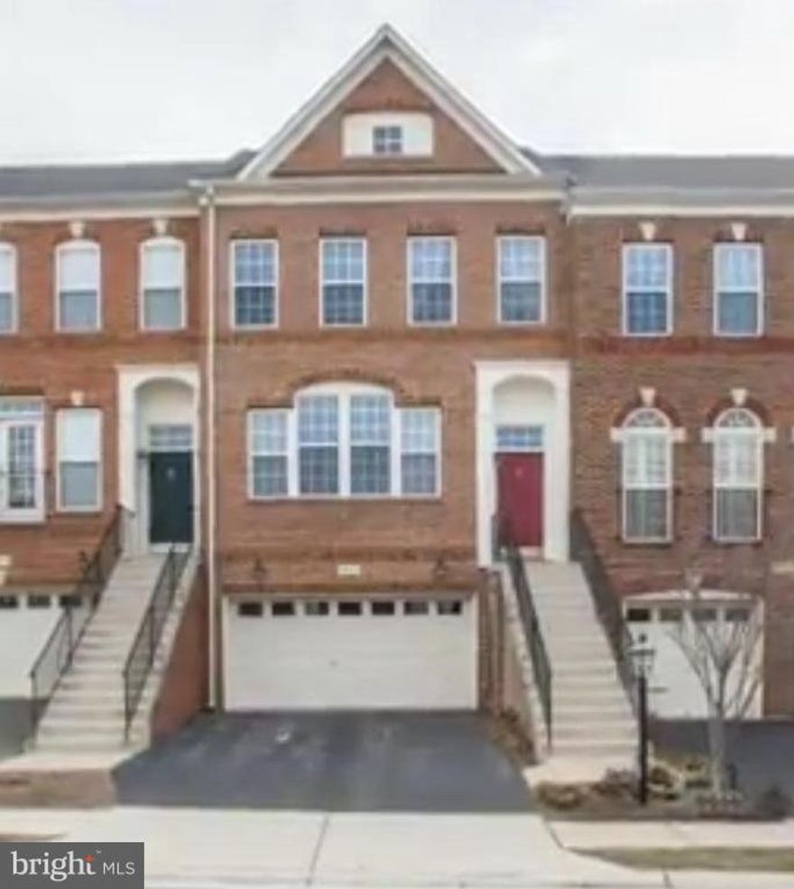 Spacious 3 level 2 car garage townhouse available for rent in the sought-after amenity-rich  Stone Ridge North community.  Lower level walk out w/gas fireplace and wet bar to fully fenced yard.  Wood floor on the main level throughout.  Gourmet kitchen w/center island and granite counter top opens to deck.  HOA included in rent.  Pls. call owner 24 hr. notice for showing.  Available August 1.