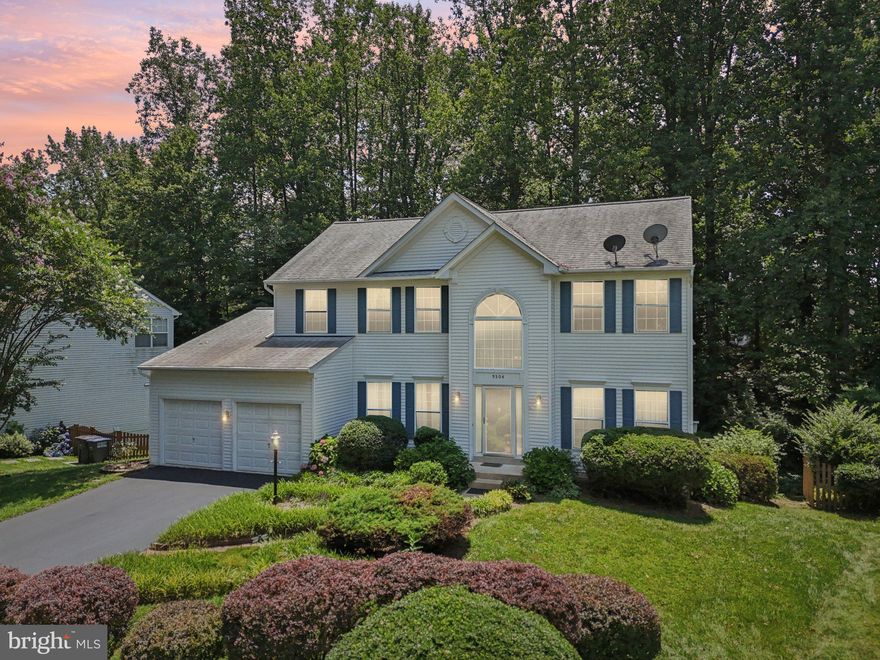 Price Reduced! Welcome to 9304 Bradley Court, a charming and thoughtfully updated 4-bedroom, 2.5-bathroom home tucked away on a peaceful cul-de-sac in Manassas Park. Blending timeless character with smart, modern updates, this residence offers both comfort and personality—perfect for buyers seeking a home with lasting quality and unique charm.

Inside, the professionally remodeled kitchen (2023) features stainless steel appliances, soft-close and pull-out cabinetry, luxury vinyl tile flooring, stylish light fixtures, and five additional cabinets for expanded storage. Designed by a professional organizer, the layout is both beautiful and highly functional. Just off the kitchen, the dining room showcases a one-of-a-kind mural inspired by the historic village of Waterford—creatively including a hand-painted image of this very home, giving the space an artistic and deeply personal touch.

The family room and breakfast area also feature luxury vinyl tile flooring (2023), while all four bedrooms were updated with brand-new carpet in May 2025. The primary bedroom includes gunstock oak hardwood flooring (2014), and the dedicated home office features new flooring as well. The primary bathroom was fully renovated in 2014 with updated cabinets, countertops, double sinks, a walk-in shower, and new flooring—blending comfort and elegance. A stunning clawfoot soaking tub adds a touch of classic luxury to the space. Both the kitchen and bathrooms are equipped with soft-close, pull-out cabinetry for a unified, high-end finish throughout. Crown molding adds classic style, while a gas fireplace provides a cozy, welcoming atmosphere in the main living space.

Just off the kitchen, you’ll find a bright and enclosed sunroom, perfect for enjoying your morning coffee or relaxing year-round. Beat the heat with a wonderfully shaded backyard, which offers privacy, serenity, and a detached shed for extra storage or workspace.

A standout feature of the home is the large, unfinished walkout basement—already plumbed for a bathroom and equipped with a utility sink. This expansive area opens to an attached lower porch and offers tremendous potential for future living space, whether you envision a guest suite, entertainment room, or workshop.

Practicality meets peace of mind with a two-car garage, providing ample parking and additional storage. The exterior has been meticulously maintained and updated. The main roof was replaced in 2018 with CertainTeed XT-25 shingles (25-year warranty), and the shed roof was replaced in April 2025. A Gutter Helmet system was installed in 2019, with upgraded and replaced gutters in 2011 and 2013. Additional exterior improvements include a resized kitchen window and matching vinyl siding (2011), as well as drywall installation in the sunroom (2012).

Energy efficiency upgrades abound, including a Carrier Infinity Two-Stage Air Conditioner and Infinity 80 Furnace (2019), R-49 attic insulation, foam insulation in soffits and joists, a solar attic fan, and an insulated attic door (2014). Electrical updates include overhead lighting in four rooms, additional outlets in the basement, and a ceiling fan in the primary bedroom.

Utility costs are budget-friendly, with average monthly bills of $95 for water/sewer, $85 for electricity, and $83 for gas.

9304 Bradley Court is more than a house—it’s a thoughtfully cared-for home with modern systems, elegant touches, and a touch of local history. Whether you’re relaxing by the fireplace, admiring the custom mural, enjoying the sunroom, or planning your dream basement space, this home is ready to welcome you with warmth and character.