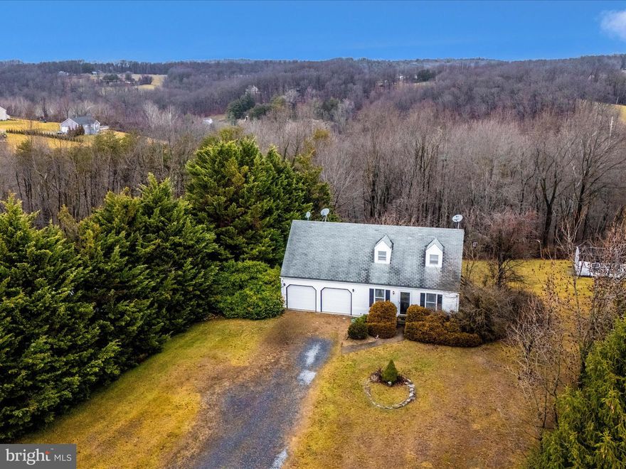 Charming cape on just under two and a half acres in the sought-after Winters Mill High School district.  Wonderful private lot, yet within a neighborhood.  Walk-out level basement.  Big 2-car garage.  Cozy floor plan. The home has many original items and is ready for updates.  Great opportunity for sweat equity.   Cash, conventional or 203K financing only. Guardianship sale.