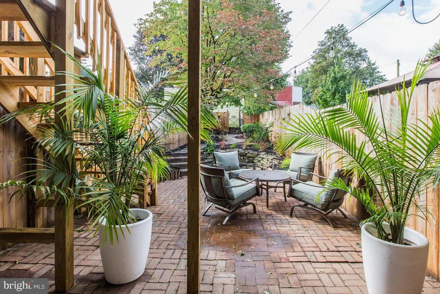 This ''Flawless Facade'' designed house must be seen! Totally renovated top to bottom inside and out. This 3 bedroom 3 bath home (1 full, 2 half) has everything you could want in a city home. Home boasts a mix of refinished hardwood and top of the line Mannington luxury flooring, a gorgeous new kitchen with granite counters and marble backsplash, stunning baths w custom vanities, a second floor laundry and truly high end fixtures throughout. The master bedroom is an oasis in the city overlooking an enchanted rear yard. A/C has been installed but you will want to spend all your time in the backyard that is the envy of the neighbors! As an extra bonus there is off street parking!