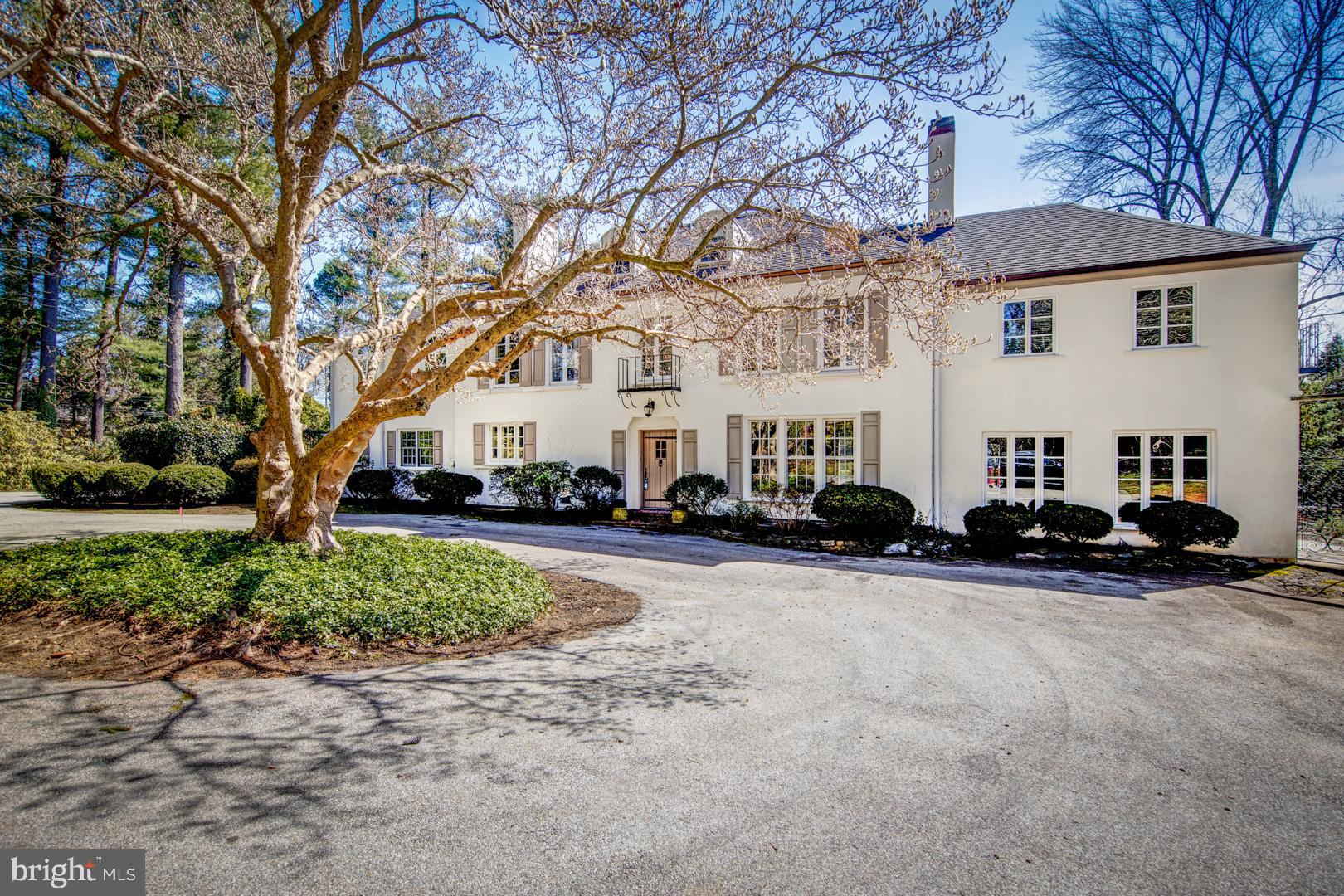 Welcome to 815 Parkes Run Lane...a traditionally styled manor home in the coveted Radnor School District in Villanova. This elegant, white stucco over masonry exterior home sits on a private 2.15 acre parcel that offers flat grounds with a secluded pool, hot tub and terrace. The Living Room w/fireplace provides front to rear exposure that opens thru french doors to a sensational full length brick terrace. The Family Room w/fireplace has a wood carved bar and ideal custom shelving. Just off the Family Room is a stone floored Sun-Room that leads out to the pool and another terrace. The large Dining Room w/fireplace is ideal for entertaining and opens to the brick terrace thru more french doors. A spectacular Kitchen with Viking stove, sub-zero refrigerator and freezer drawers with white cabinetry compliments the granite countertops and brick back splash with an intimate breakfast area that overlooks the eastern part of the property. The second floor has a large Master Suite w/fireplace, deluxe Master Bath and loads of outfitted closets. Three more bedrooms and another large bedroom suite, complete with vaulted ceiling and back staircase, finish the second floor. The third level has been finished and is perfect for another guest area of the home, home office or in-home school workspace. Parkes Run Lane is 30 minutes from Center City and Philadelphia International Airport and 90 minutes from New York City.