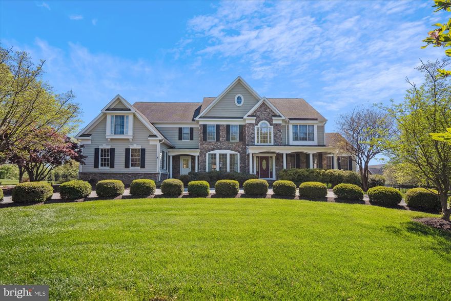 Get ready to be wowed! Nestled on a sprawling, perfectly level acre, this stunning stone front estate is an absolute dream! Picture yourself pulling into the elegant semi-circle driveway and parking with ease in the convenient side-load three-car garage. Step inside and prepare to be bathed in the warm glow of gleaming hardwood floors that flow effortlessly from one gorgeous room to the next! The dramatic two-story great room will take your breath away, anchored by a cozy gas fireplace that seamlessly opens to a spectacular, sun-drenched gourmet kitchen – the perfect spot for creating memories and hosting unforgettable gatherings!  Upstairs, discover your own private oasis in the posh master suite, complete with an abundance of closet space and a luxurious primary bath that will make you feel like you're in a five-star spa!  But wait, there's more! The finished basement is an entertainment paradise, boasting a fantastic recreation area, a fun-filled game room, and a home theatre where movie nights will never be the same! Plus, there's a convenient 5th bedroom and a full bath – ideal for guests or a growing family! Don't miss out on experiencing all this home has to offer! Click on the camera icon right now to take a virtual floor plan walk-through tour – you won't be disappointed!