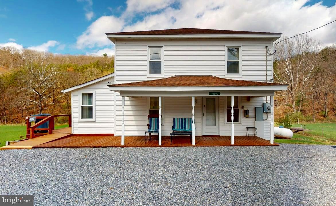 It is time you escape to the Mountains! What a rare find in beautiful Hampshire County! Come live in the peace and privacy of the countryside with this beautiful well maintained 4-bedroom, 2-bathroom farmhouse nestled on 103 unrestricted acres of lush pastures, open fields, and mature forest in scenic Rio, WV. With six hunters cabin's scattered across the property, hunting in the elements will be a thing of the past! This wildlife rich property is excellent for hunting deer, turkey, and even bear! A peaceful stream flows through the property year-round, adding both charm and a natural water source perfect for livestock, gardens, or simply enjoying the scenery! The Rustic barn with authentic character is ideal for for animals, hay, or farm equipment! The additional storage building offer's a versatile space for tools, feed, and supplies! Offering stunning mountain views all the way around, with easy access to Nathanial Mountain over 10,000 acres of public hunting! Whether you’re dreaming of a homestead, a private mountain getaway, or a hunting retreat, this property offers freedom, functionality, and everything you love about Wild and Wonderful West Virginia!