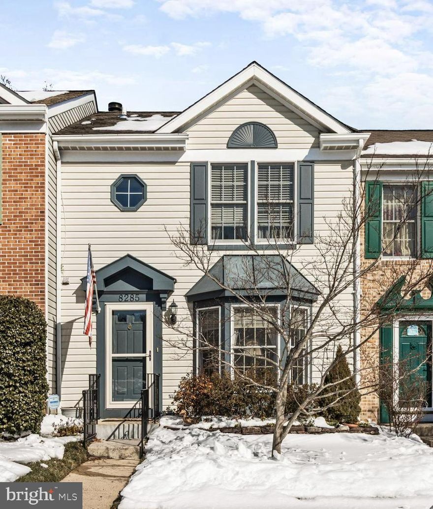 *** A BEAUTIFUL HOME! *** Move right into this truly wonderful Southfield townhome, perfectly set on a prime, private lot backing to woods and tucked away from Berryfield Dr. Gorgeous hardwood floors throughout the main level, featuring a bright and spacious living room with bay window and a formal dining room with sliders to a large deck and steps to the yard. The eat-in kitchen offers a pantry, recessed lighting, tile backsplash, and all appliances—including a brand-new microwave. On the second floor, the primary bedroom features a vanity, walk-in closet, and access to a stunning new hall bath (2025) with double sinks, crown molding, LVP flooring, and tiled bath surround. The finished lower level includes a recreation room, full bath, laundry room, built-in shelving, and a cozy wood-burning fireplace, plus sliders to the patio, fenced rear yard, and shed. Recent HVAC (2023). ** Truly a GREAT BUY!  **