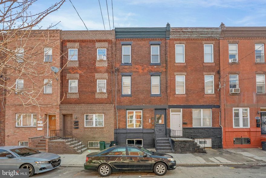 2137 S 15th Street is an updated, separately metered triplex in Philadelphia's West Passyunk neighborhood with two large 1-bedroom apartments and one over-sized studio. Unit #1 has recently been rehabbed and has an open living room and kitchen at the front with hardwood floors and a pair of tall windows. A bonus space at the center is ideal for a dining room, media room, office, or hobbies. At the rear are the large bedroom and modern full bathroom. This apartment also has access to a private patio and the basement. Unit #2 Just painted, this unit has a similar layout with the open living room and kitchen at the front, the bathroom at the center, and the large bedroom at the rear. This apartment is rented at $1,375.00/ month expiring 12/31/2026. Unit #3 features an expansive, bright, open floor plan that allows a flexible layout with plenty of space for both living and sleeping areas. A sunlit bathroom completes the apartment. Do the numbers, this property offers huge cash flow and 2137 S 15th St’s prime location is just off Passyunk Ave and Broad St. Top restaurants, friendly shops, and lively entertainment fill the surrounding blocks. There’s also easy access to popular shopping centers, public transit, the sports complex, I-76, I-95, and South Jersey. Schedule your tour today!