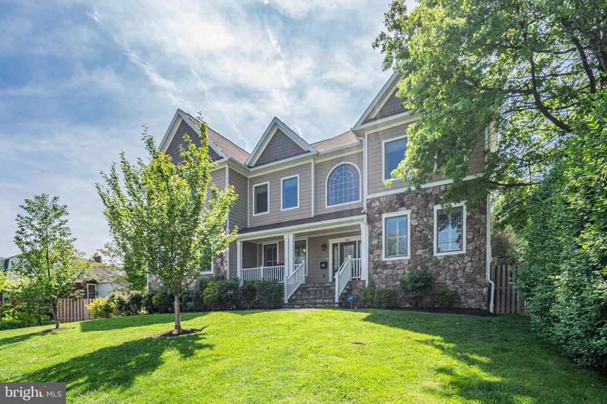 This home is *Spectacular* providing an abundance of space with large rooms and comfortable living on every level and exquisite finishes throughout. First, step outside to the beautiful backyard, a wonderful 1/2-acre lot, wide and deep and fully fenced - almost unheard of in N. Arlington - for endless enjoyment and entertainment for all.   This wonderful green space will bring you so much satisfaction, relaxation and Fun!  Front porch is perfect for morning coffee. Inside, the two-story foyer and winding wooden staircase welcome you in with the dining room on the left and elegant living room on the right.  Walk through to the gourmet kitchen which is open to the family room with 20' ceiling and fireplace.  This kitchen is a chef's dream with stainless steel appliances, gas cooktop, an enormous island for sitting, a separate breakfast space for a table, a large pantry and ample cabinetry for all of your necessities.  You will enjoy cooking and entertaining in this home.  The kitchen and family room open up to the deck in the rear overlooking fabulous flat and fenced yard. Again, a true gem in N. Arlington.  Convenient mudroom adjacent to kitchen and just off the garage for unloading and powder room for easy access. There are 6 bedrooms and 5.5 Baths with a large main level bedroom suite &  lower-level bedroom suite. Every room is substantial.  The upper level is stunning with a gorgeous primary suite, two walk in closets, enormous bathroom with soaking tub , separate shower, double vanities and additional closet space.  There are 3 additional bedrooms on the upper level with connected bathrooms, two share a gorgeous Jack and Jill and the other is an independent suite. Also, ideally located on the upper level is the laundry room, doing the laundry is easy.  Finally, enoy the generously sized lower level with recreation room, games area, bar with seating, dishwasher, wine fridge, and cabinets. There is also a large lower bedroom suite.  This home is conveniently located for Ballston Metro,  Westover's shops and restaurants and the popular Pupatella Pizza.  There is plenty of storage for all your extras. Do not miss this wonderful spacious, comfortable home and fabulous backyard for fantastic living. Looking for your needle in the haystack. Here it is. Welcome Home!